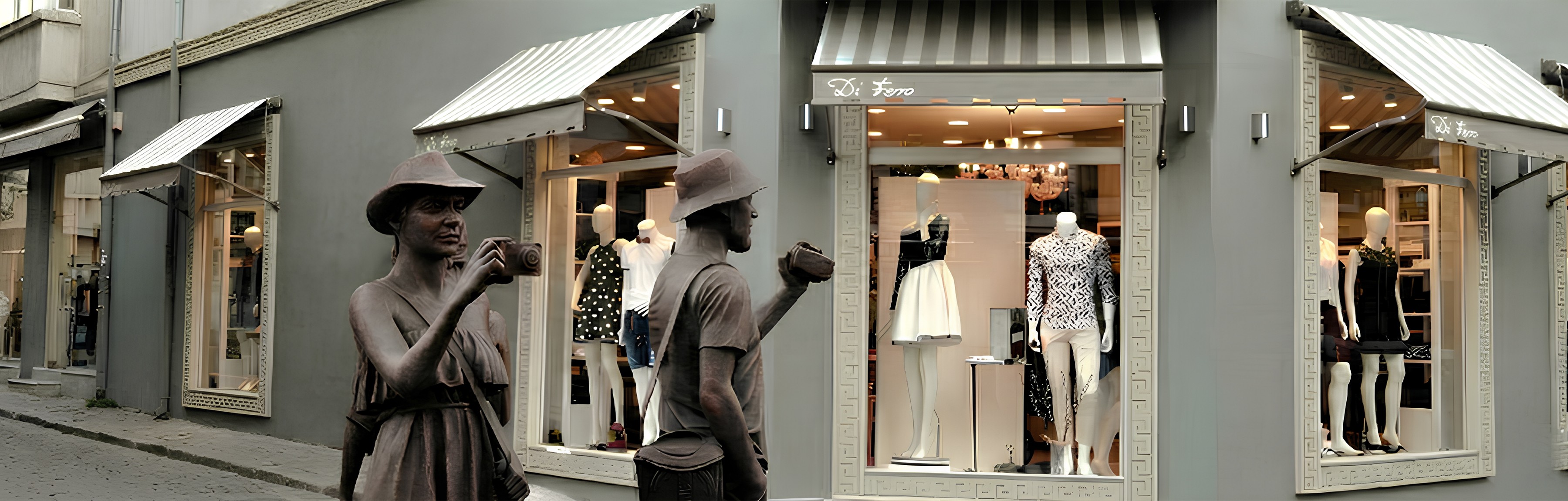 woman holding a phone and man looking at the phone. both are smiling