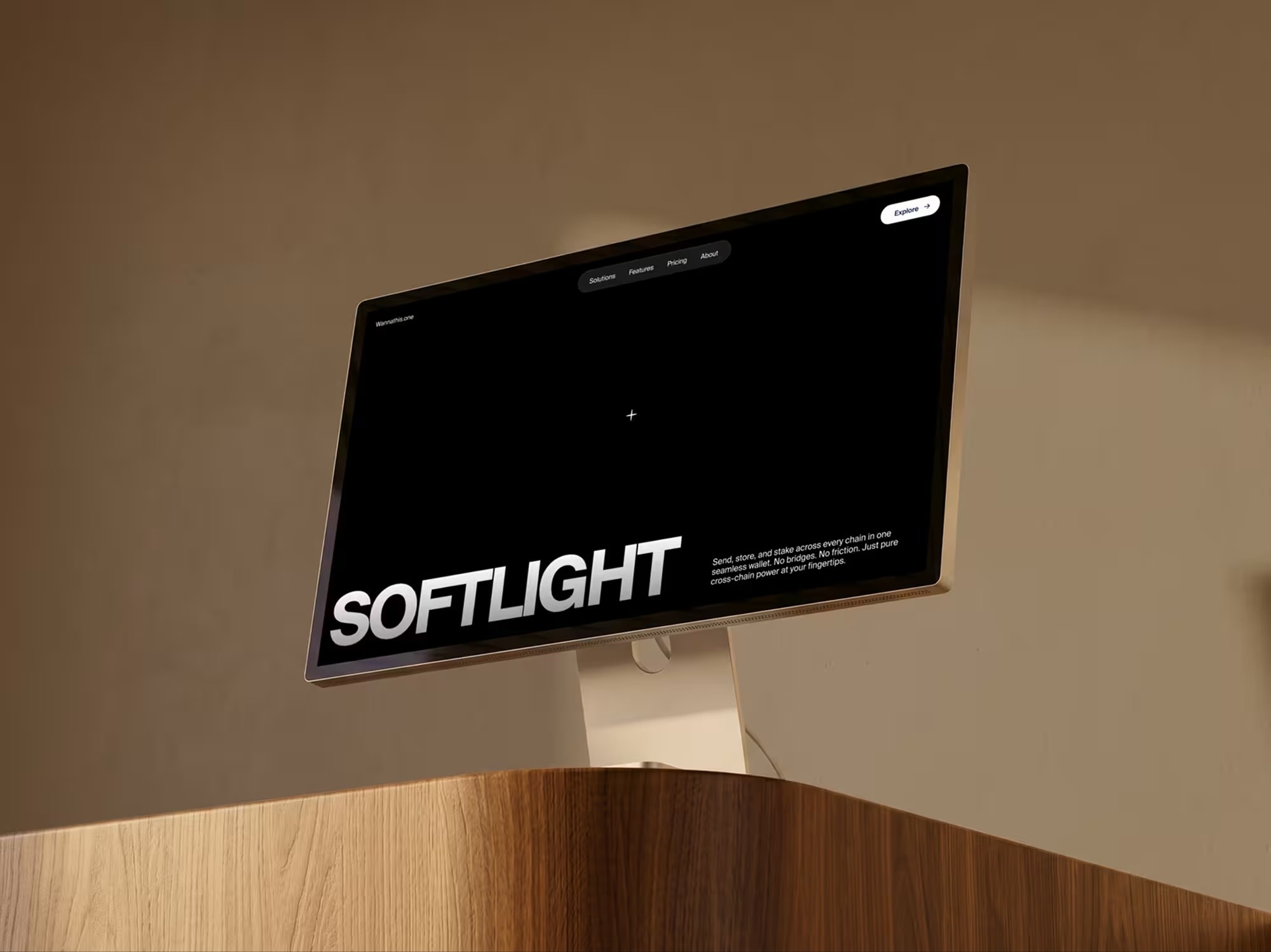 Monitor on a wooden stand showing a black landing page