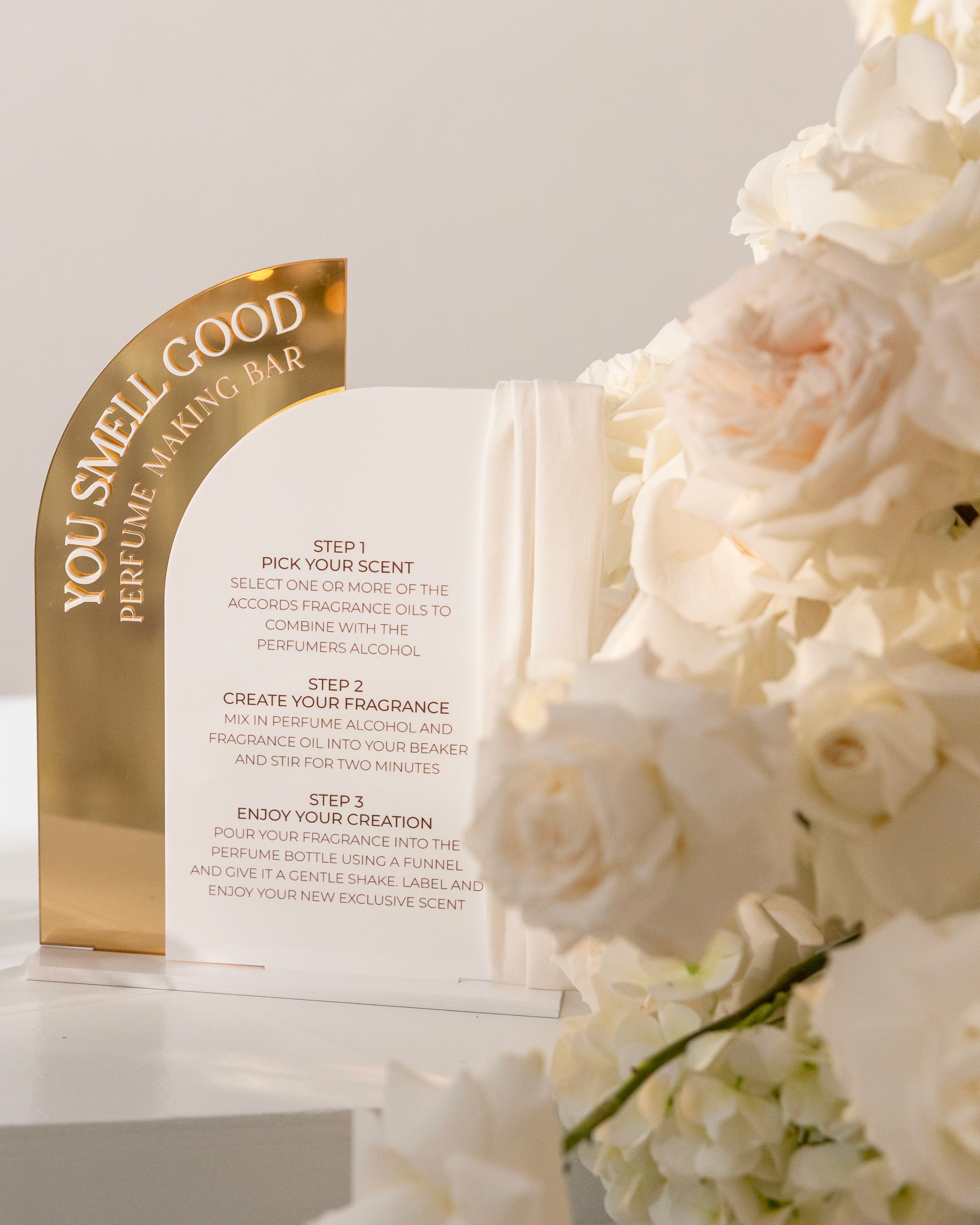 person holding amber glass bottle