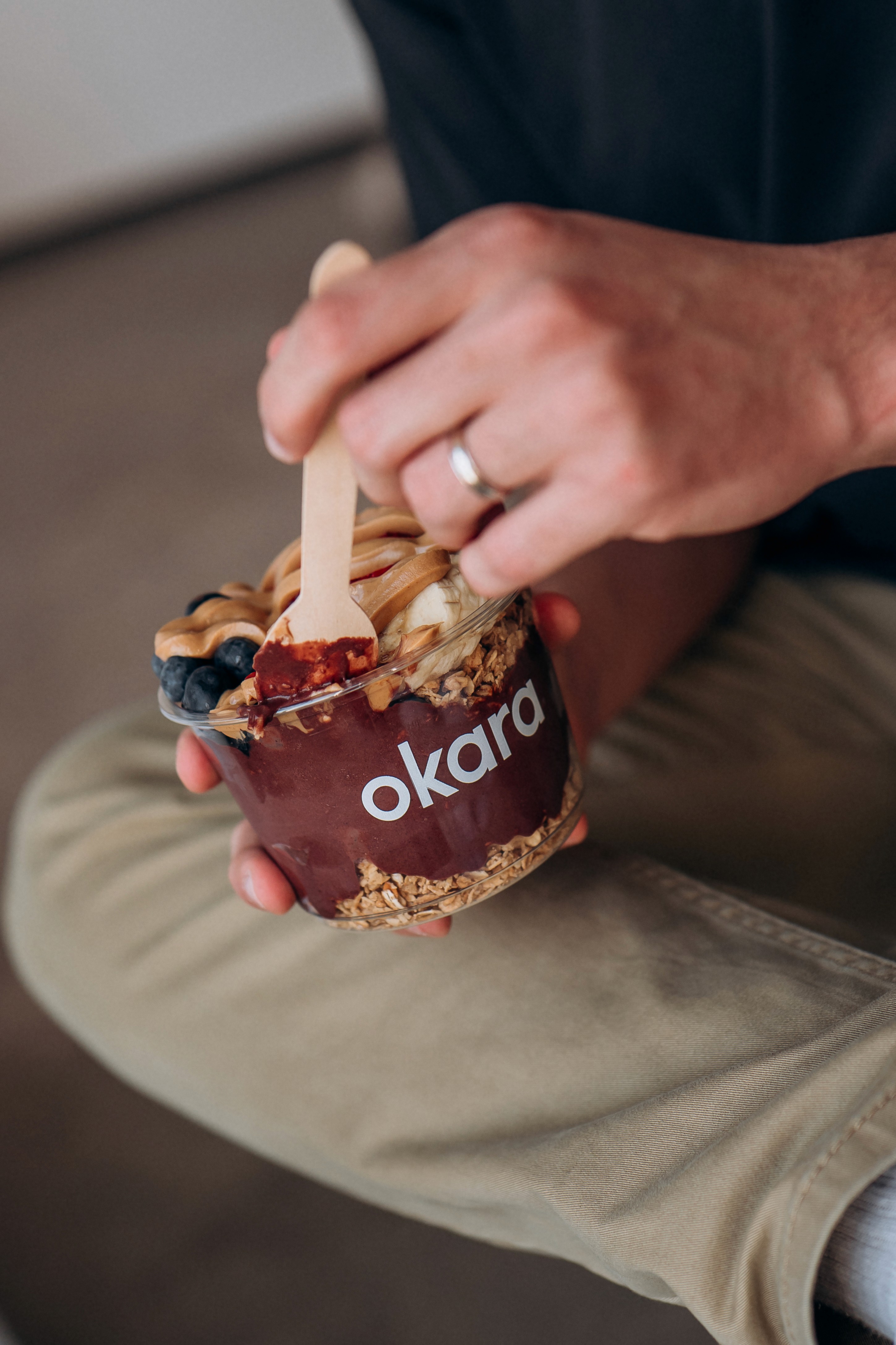 two people looking at a tablet and smiling