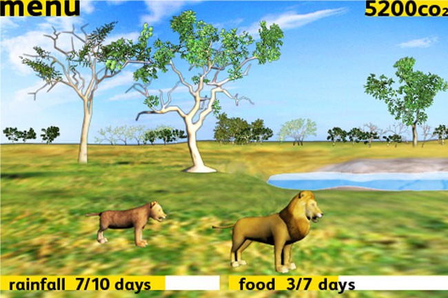A screenshot from a computer game shows a savanna-like landscape with a lion and a smaller lion-like creature standing on green grass near a body of water. Trees are scattered across the background under a blue sky with light clouds. The top of the screen displays “menu” and “5200 co2”. At the bottom of the screen, “rainfall 7/10 days” and “food 3/7 days” are shown.