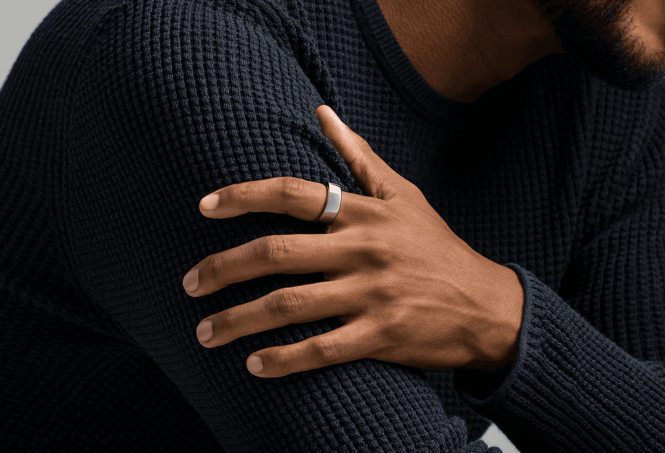 woman holding iPhone during daytime