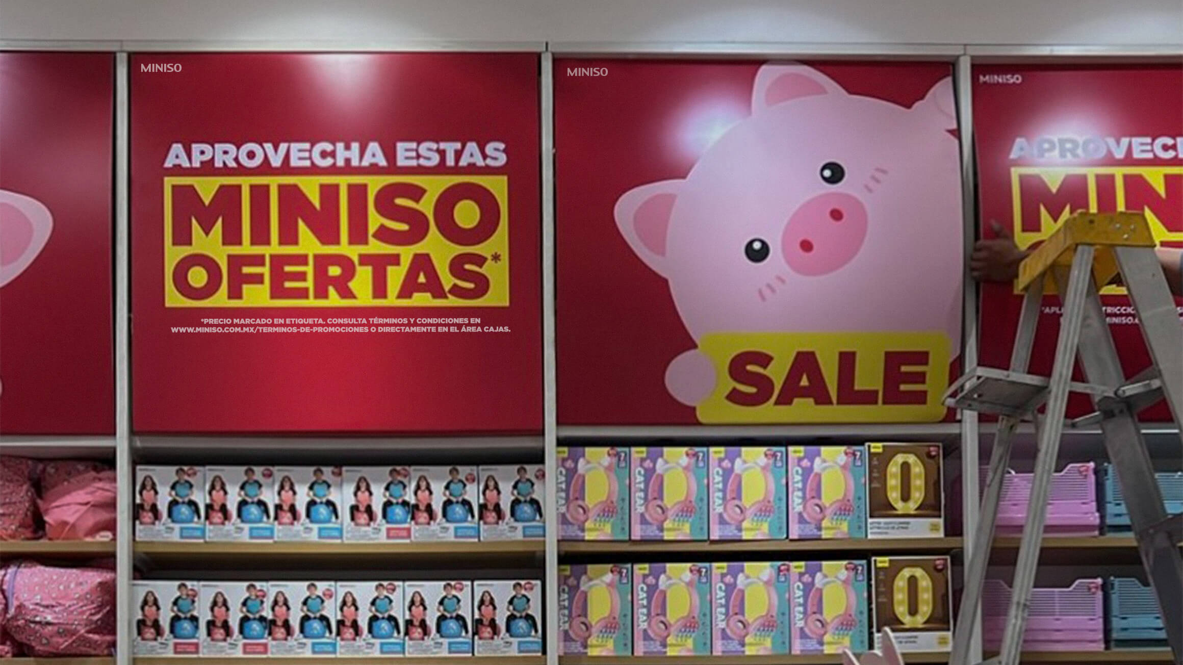 Snow-covered mountain peak emerging from clouds