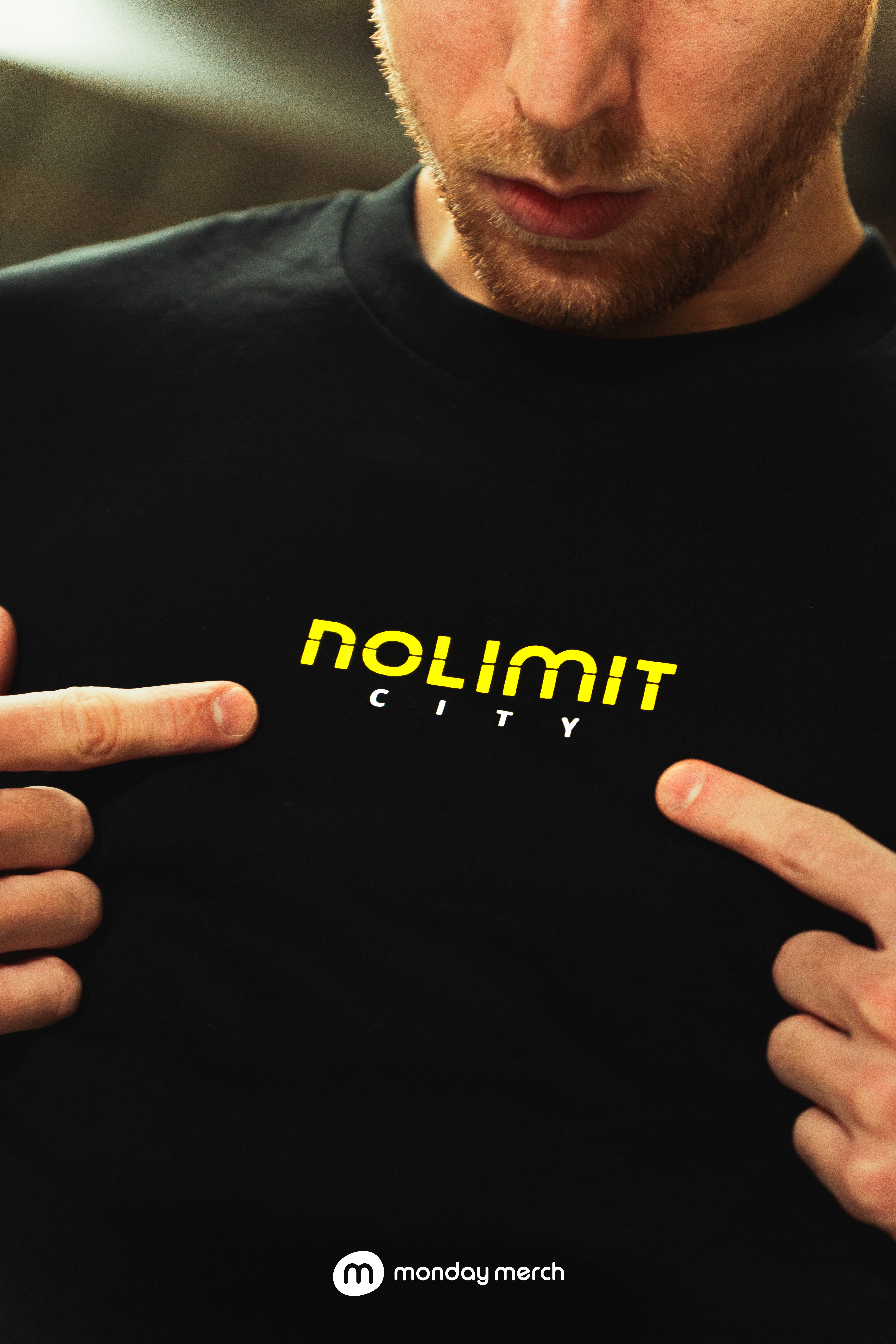 Black T-shirt with a green Earth logo