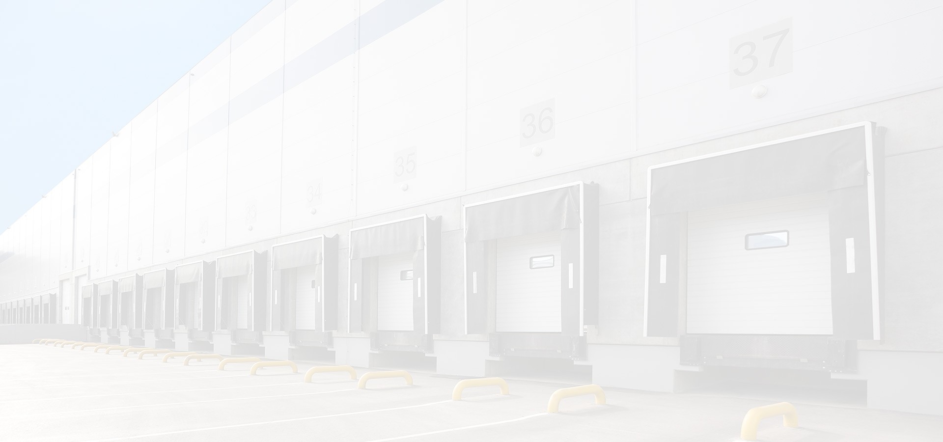 Large scale exterior of warehouse photographed at an angle.