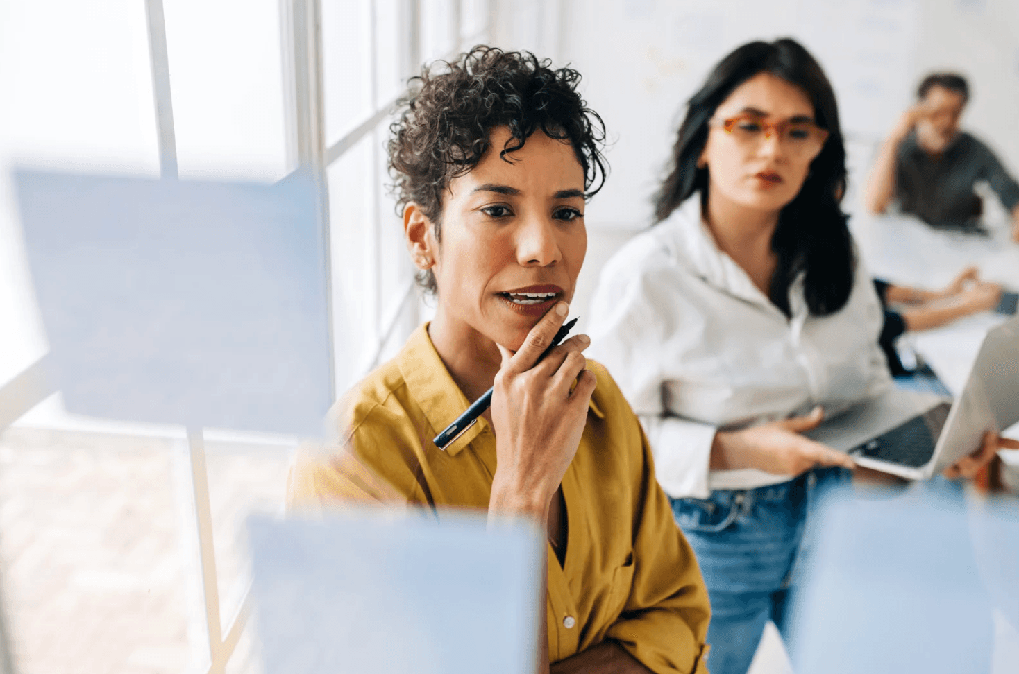 Amazon PPC agency professional discussing Q4 campaign strategy and limitations during peak season planning meeting