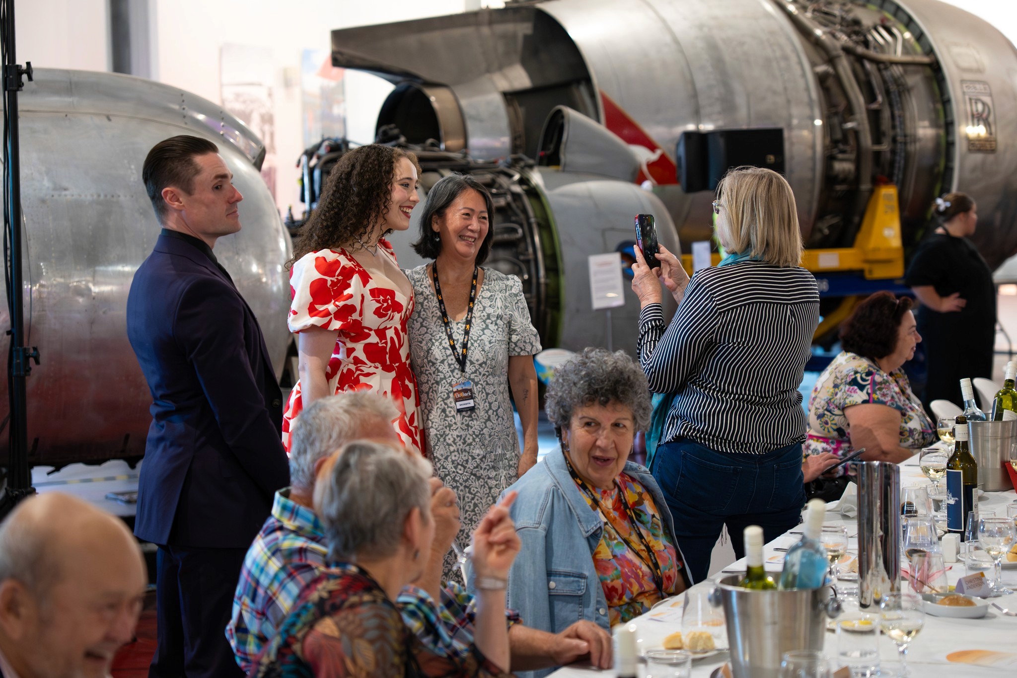 Guests taking pictures at the QANTAS Founders Museum during the Long Lunch