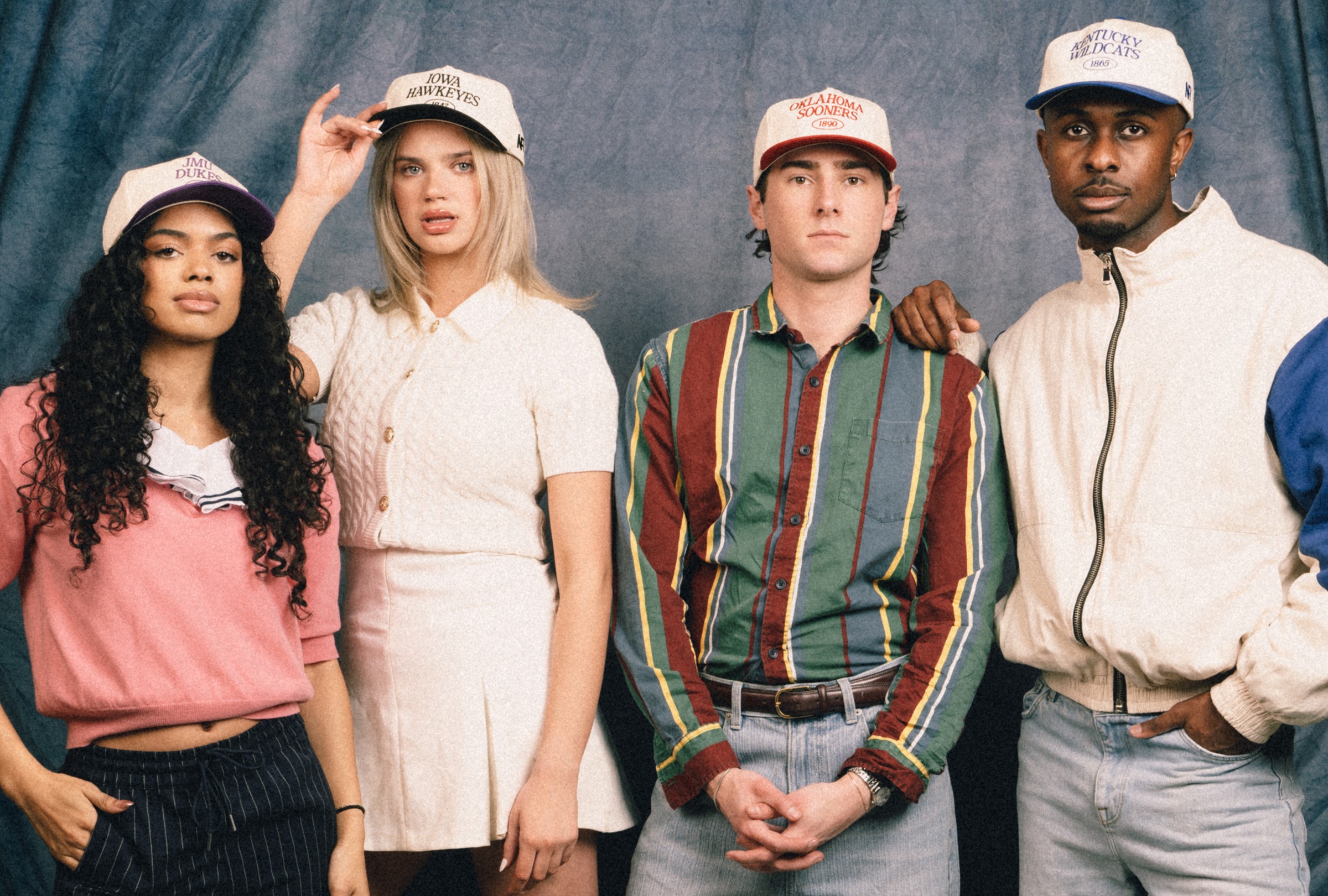 Streetside billboard with flyposters of the Batch.Works brand and illustrations