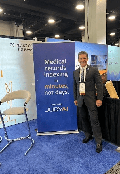 Convention Booth at ILTACON 2024 for Gemini Legal promoting JudyAI Medical Records Indexing with John Blake, head of Sales