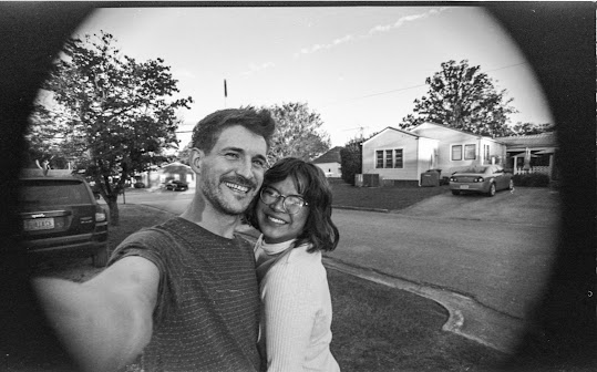 a person standing in front of a building