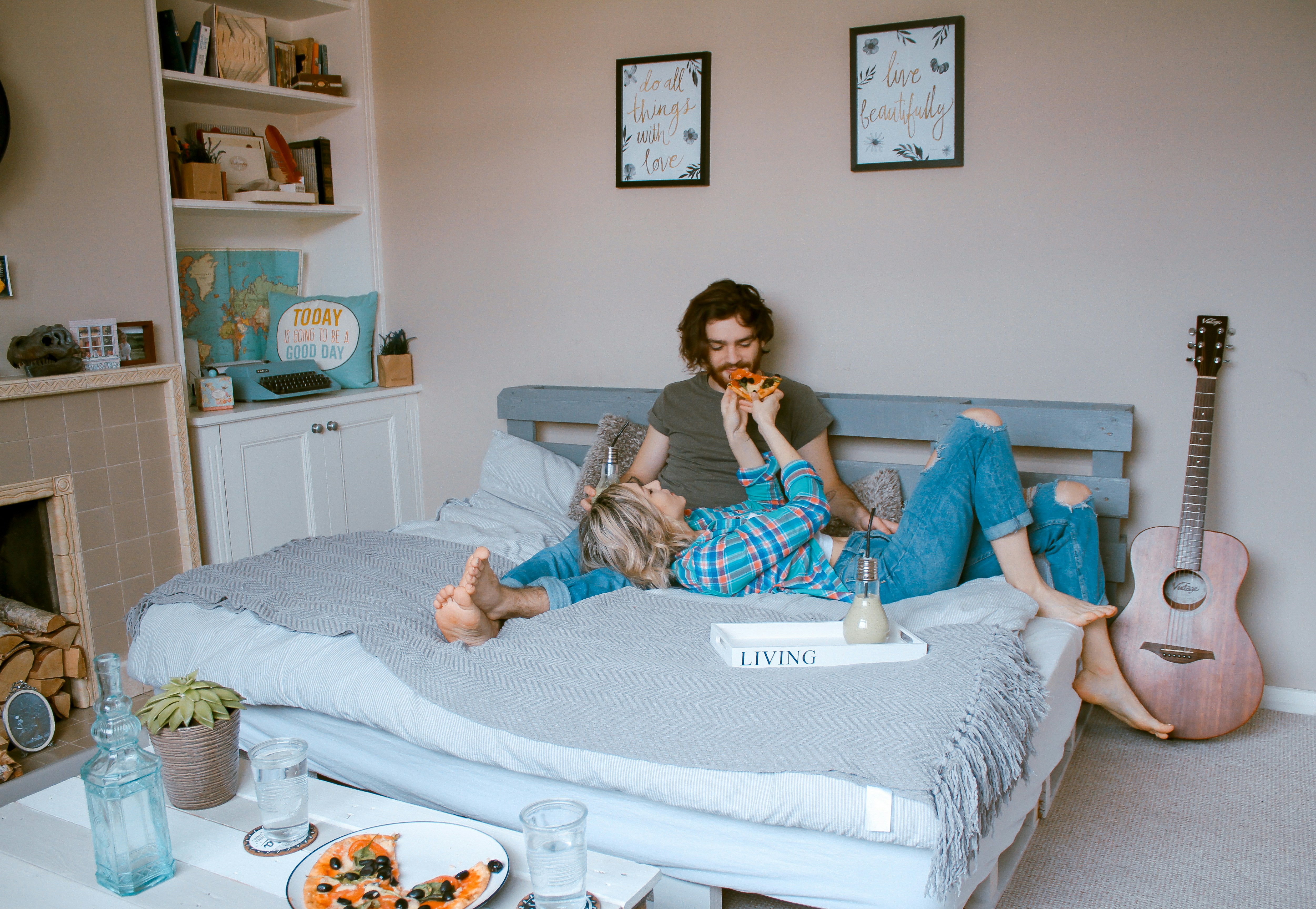 A Couple laying on bed - Preppy Bedroom