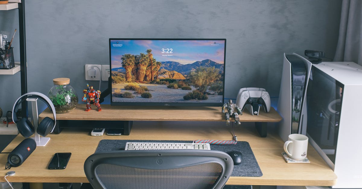 A contemporary home office desk featuring a computer setup with gaming peripherals and decor.