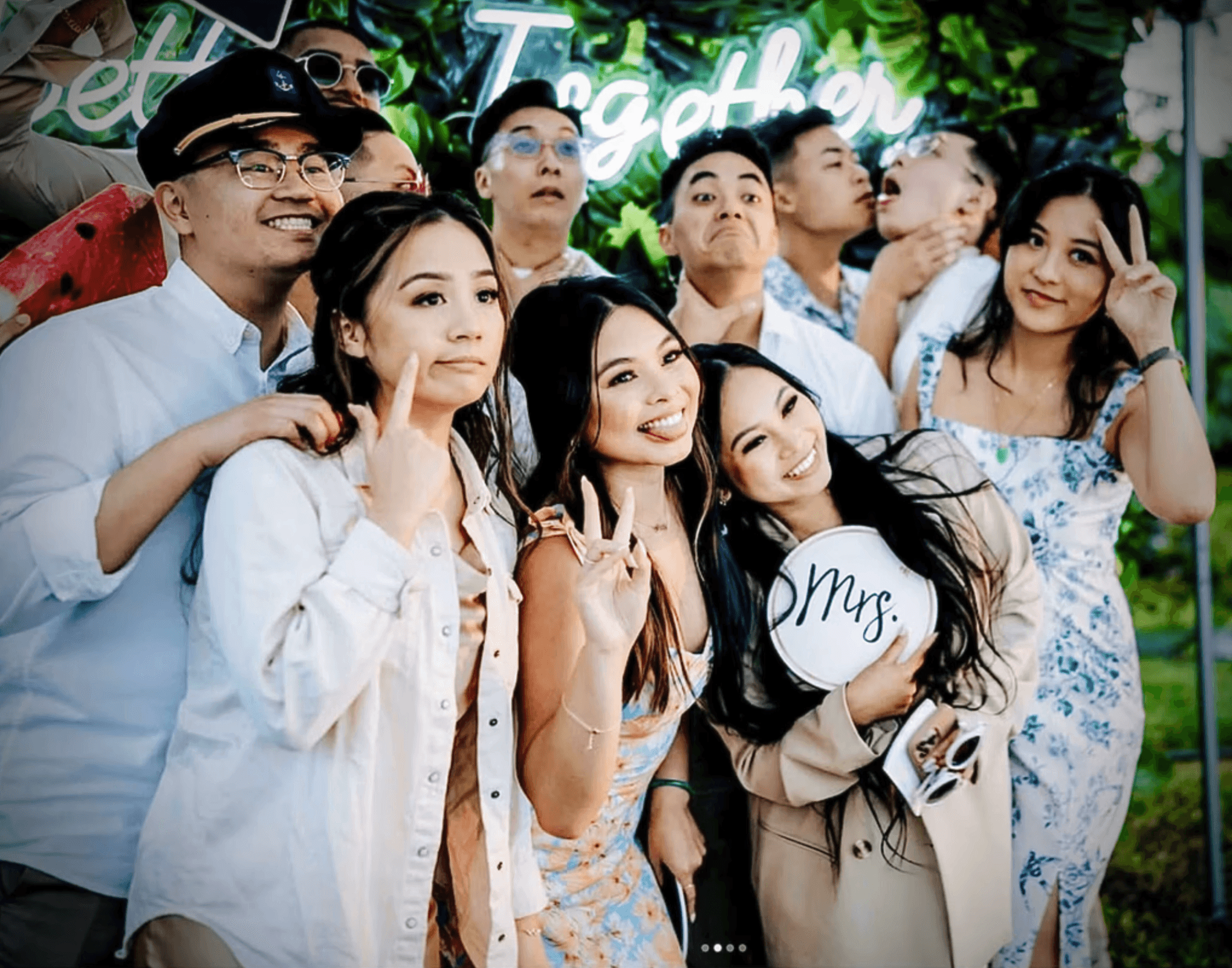 A large group of people standing around a stage