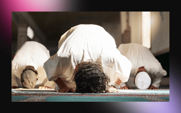 Muslim man offering prayer in mosque