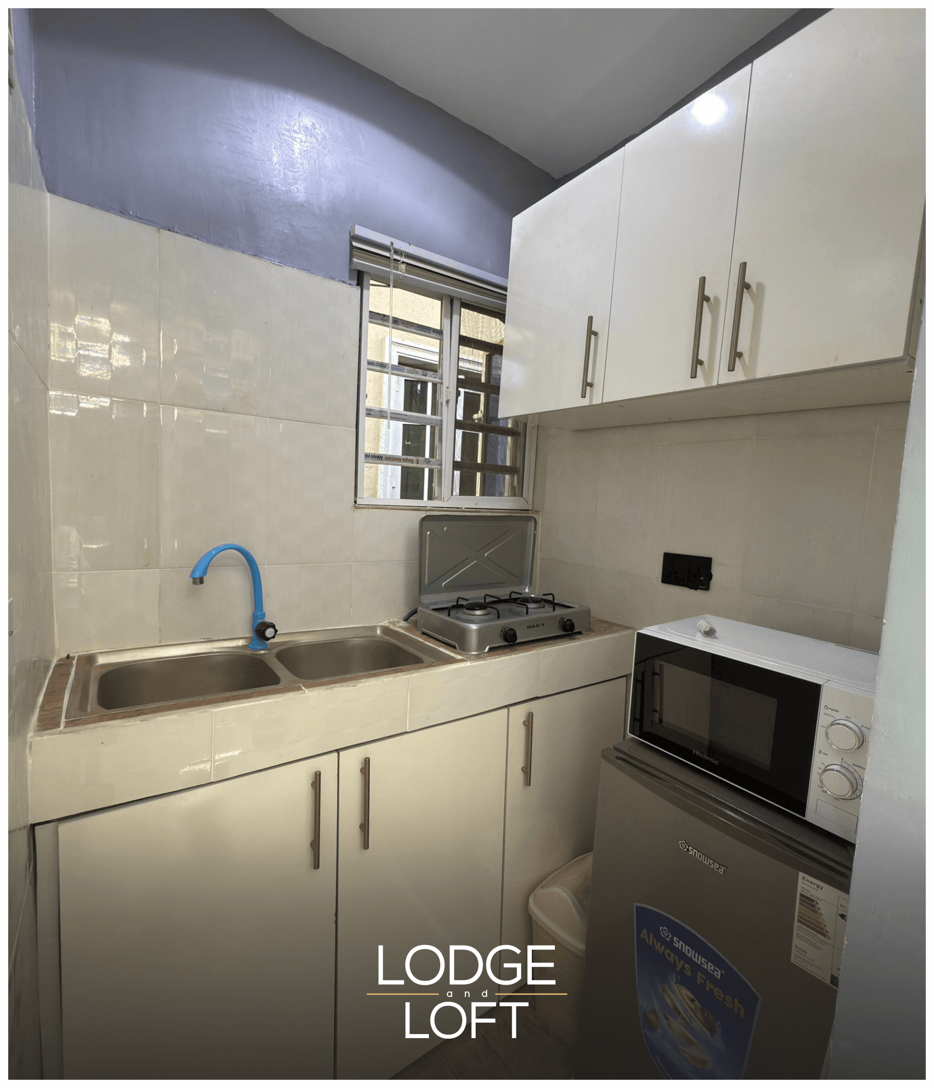 Modern kitchenette at Luxeloft Isimi Apartment, a one-bedroom shortlet in Gbagada, Lagos