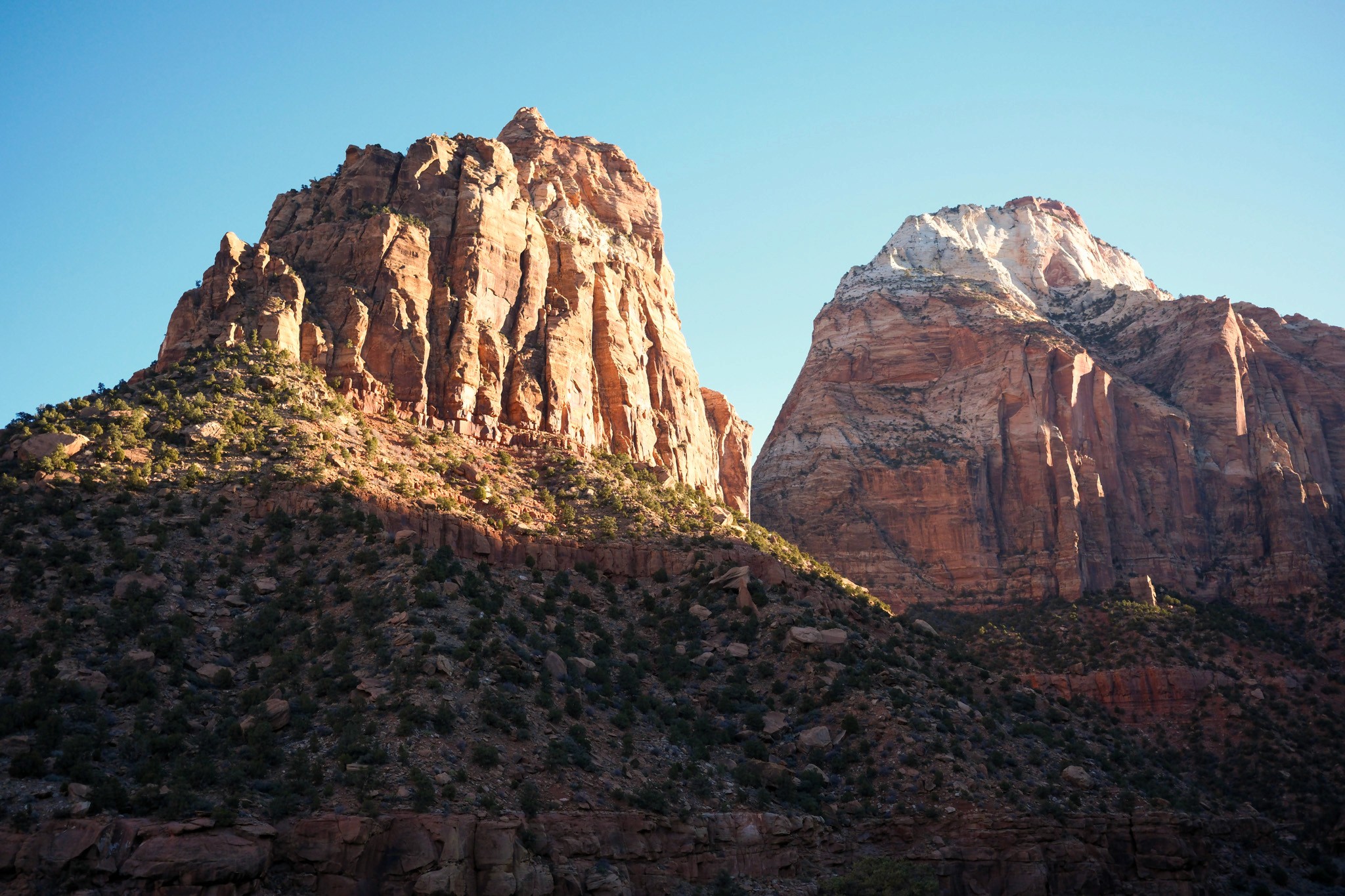 man filming on beach