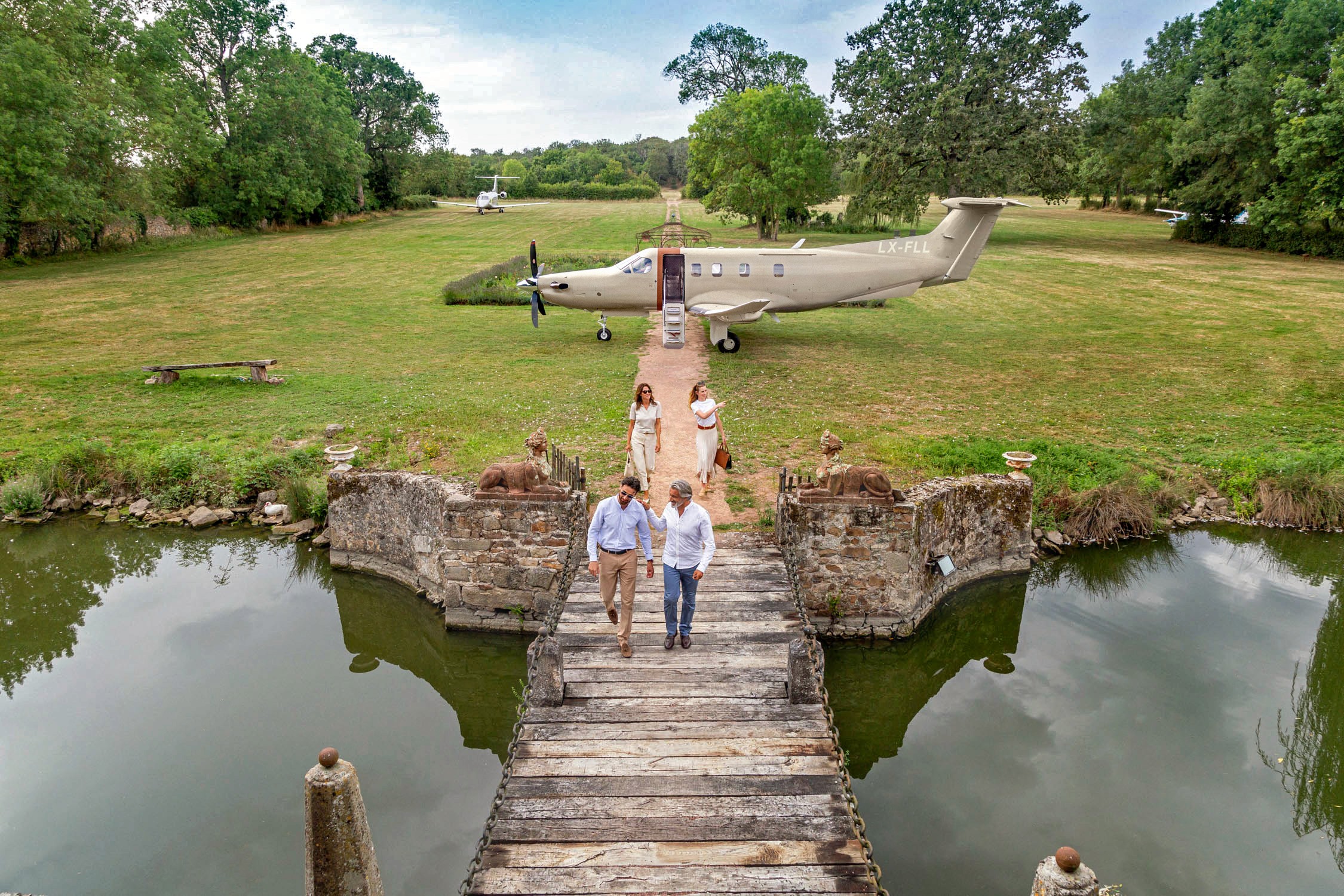 Jetfly Pilatus PC-12 in the garden of a castle.