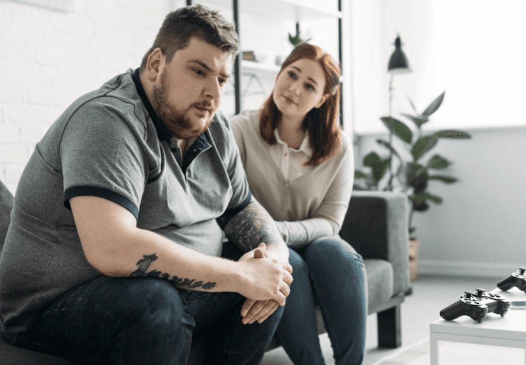 man and partner discussing health concerns related to erectile dysfunction and wellbeing