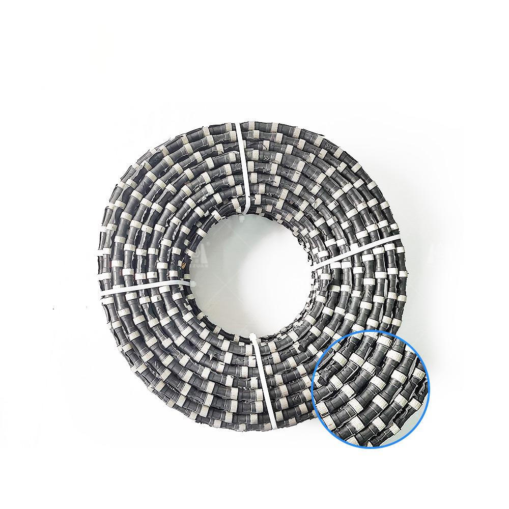 Coiled Diamond Wire Saw for granite with multiple cutting beads visible.