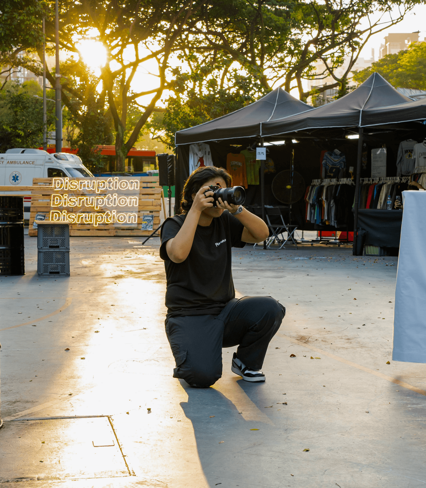 Afiqah, Co-founder of AKAR CO., assisting in capturing precious moments during one of AKAR CO.'s performances at *SCAPE