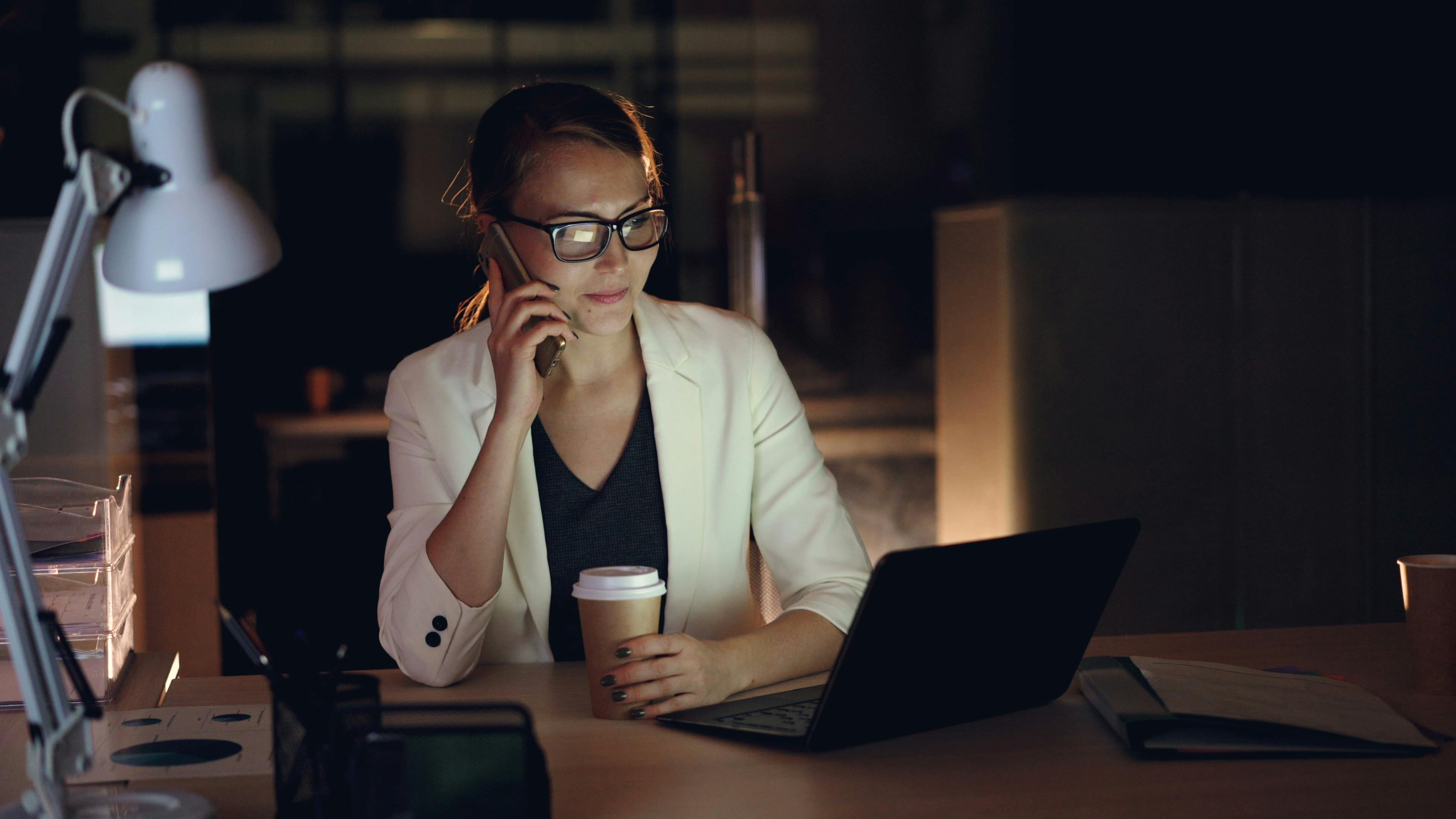 Woman looking at laptop