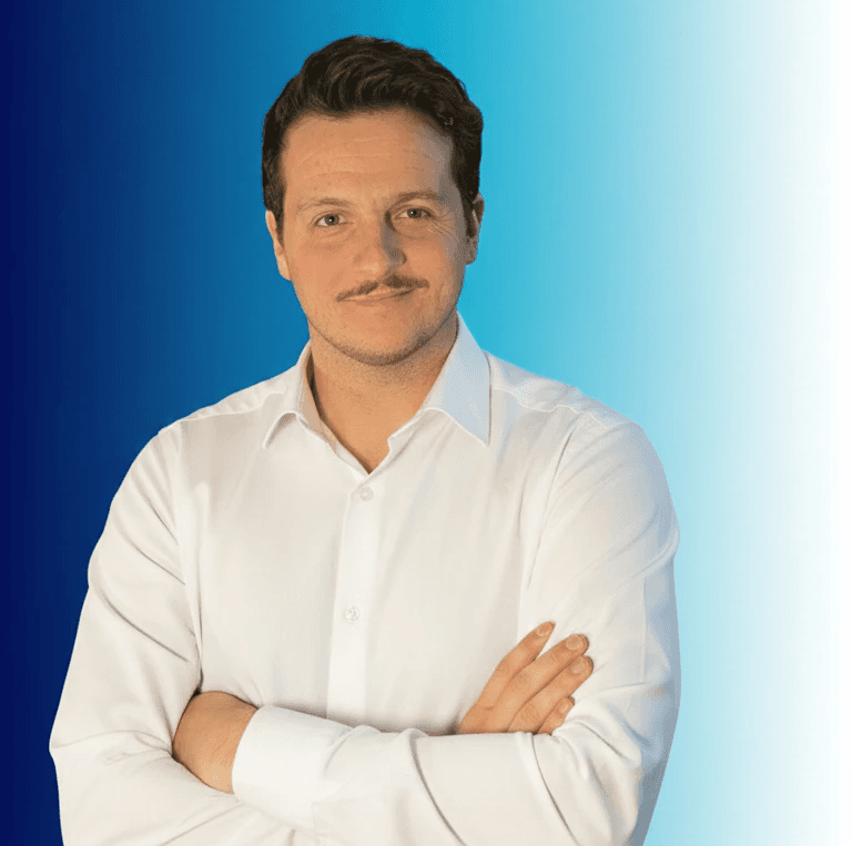 a man in a suit indoors