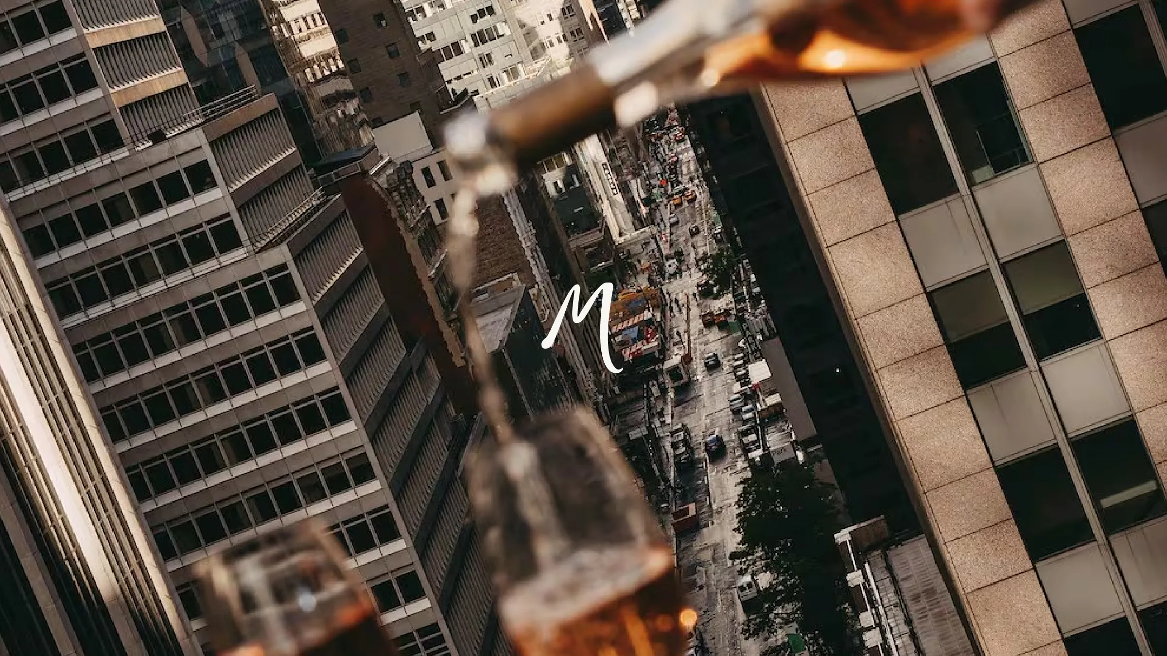 Aerial View of New York City with wine being poured in the foreground