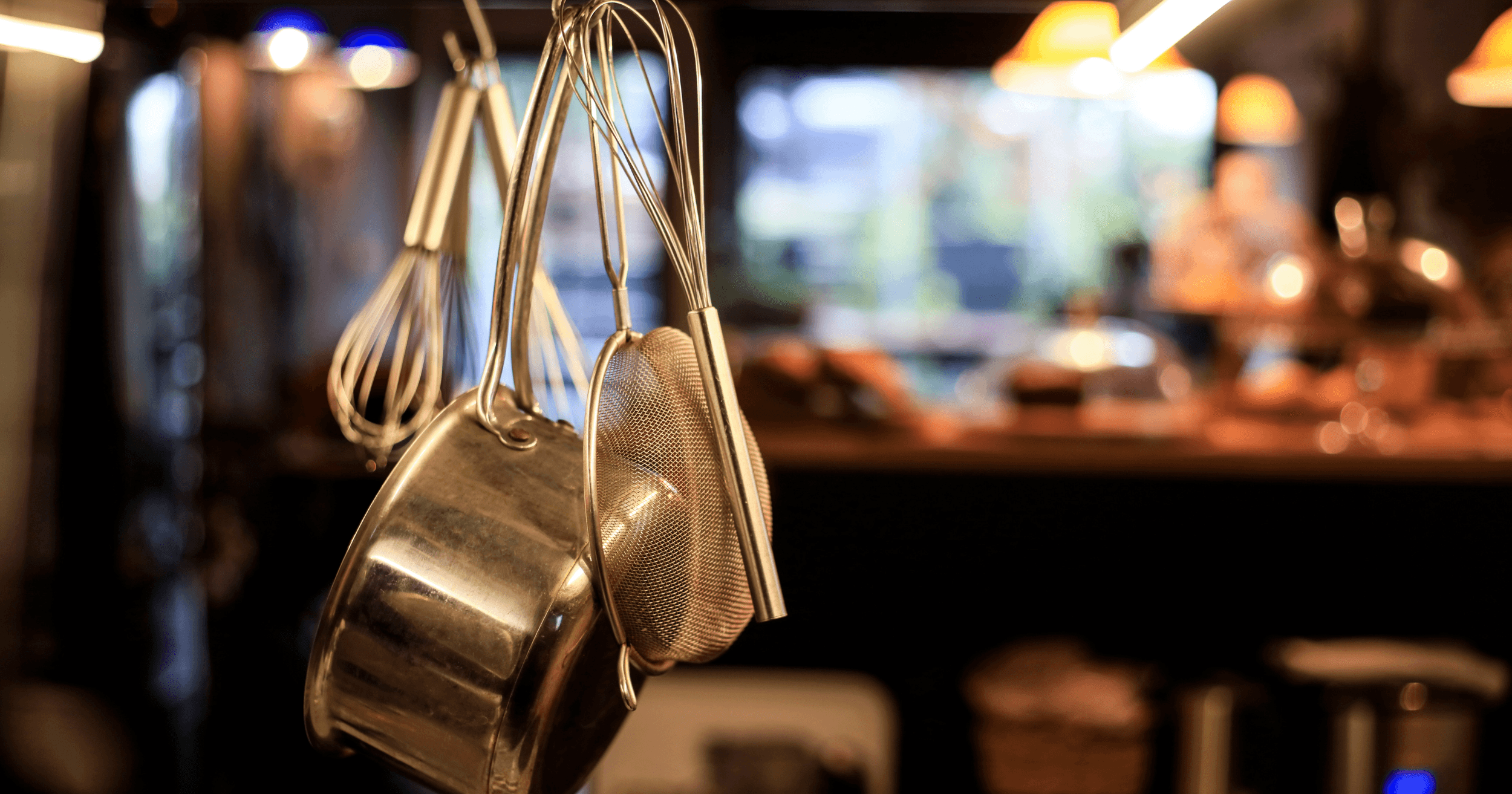 Kitchen equipment hanging in a restaurant