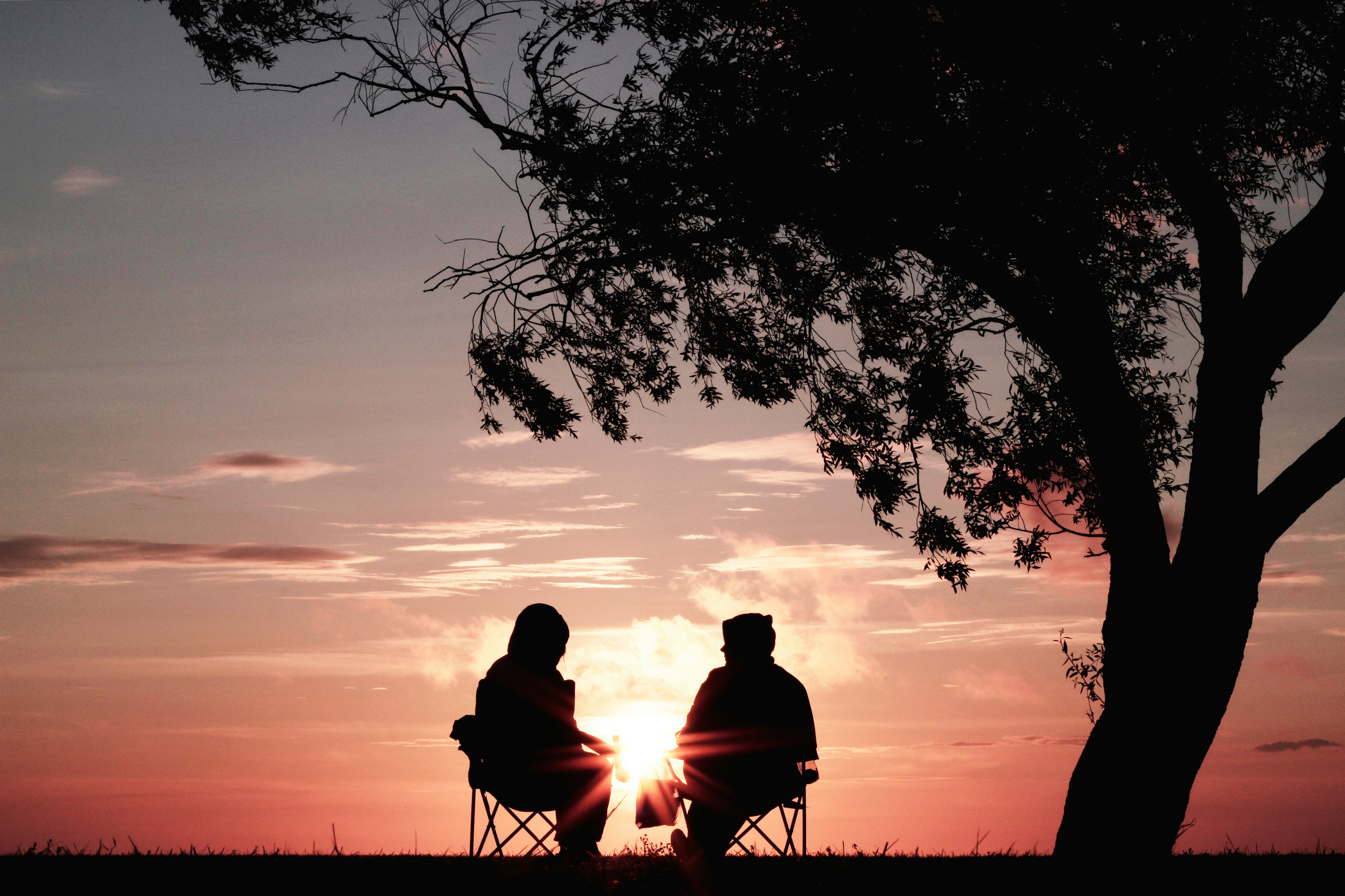 Retirees Watching a Sunset
