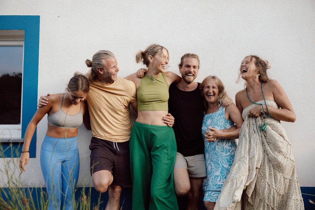 brown and green mountains beside body of water during daytime