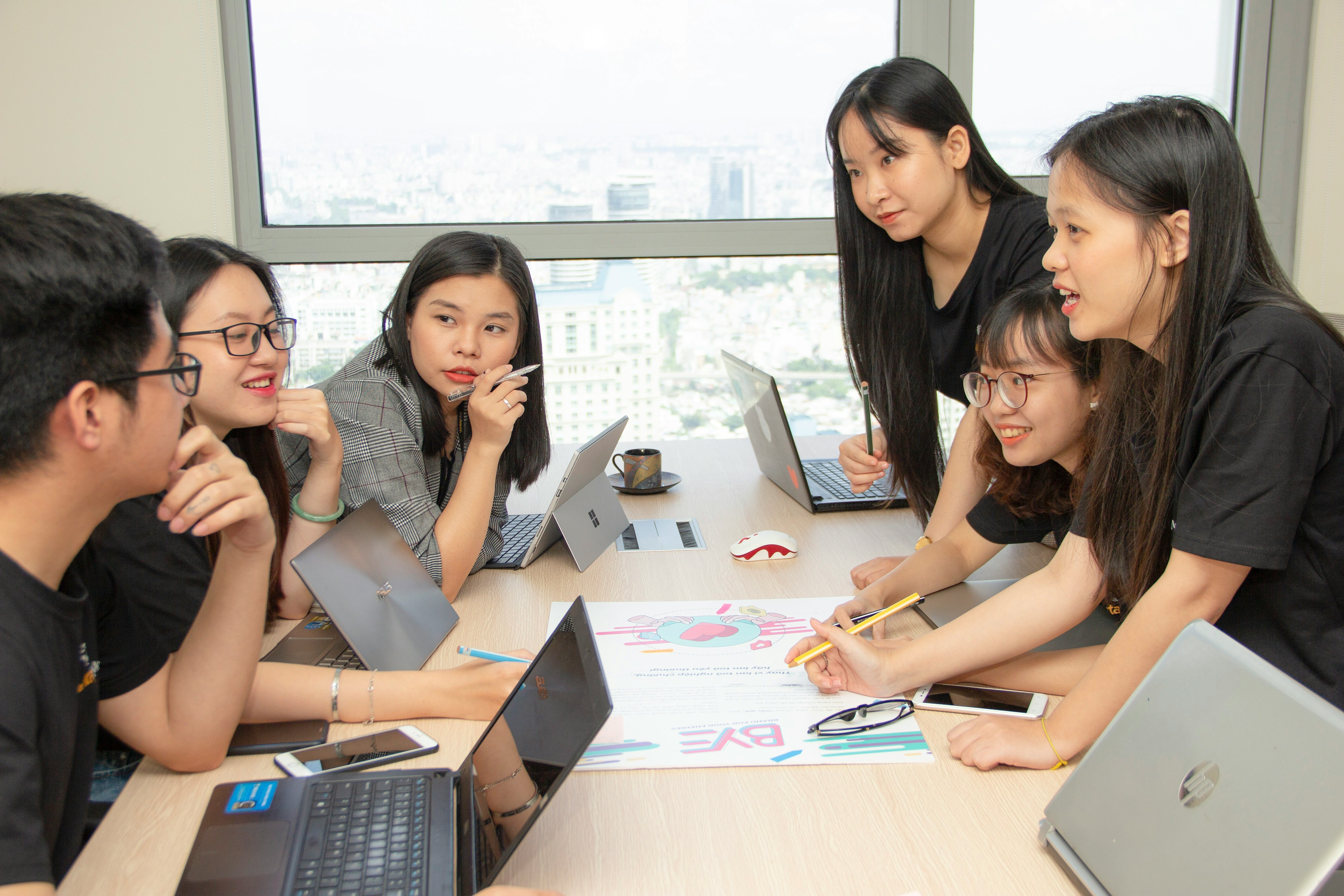 person in a meeting with data team - Sales Funnel Stages