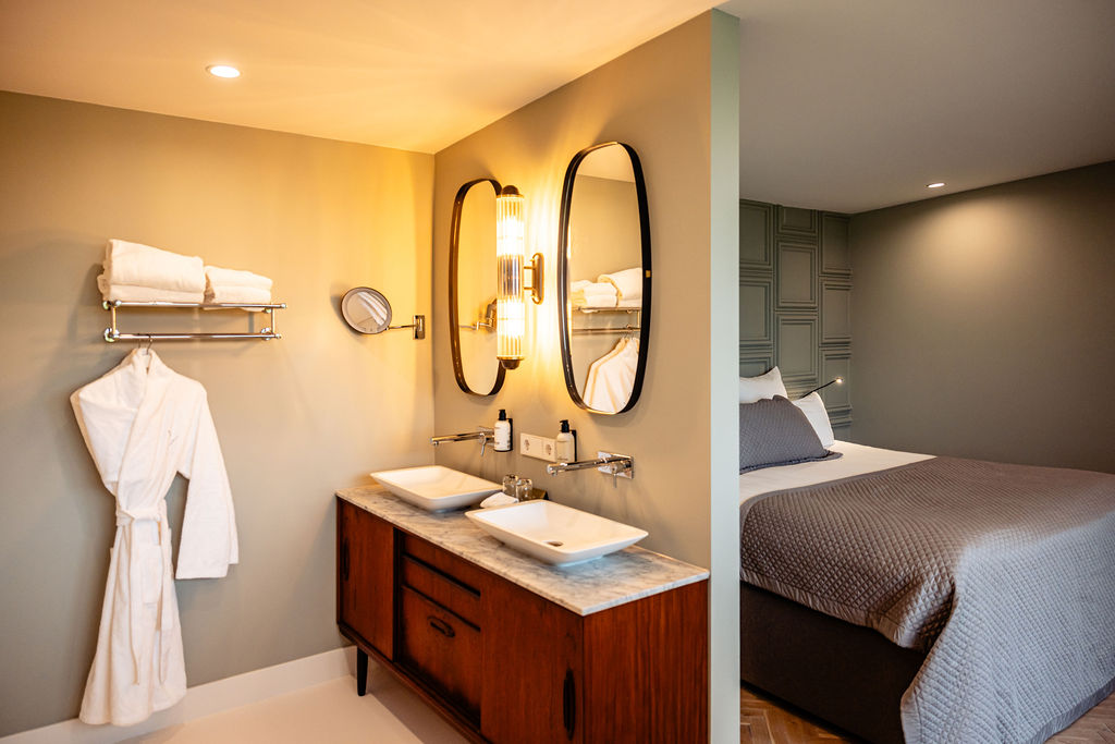 Sage green walls bedroom with lilac duvet and modern style