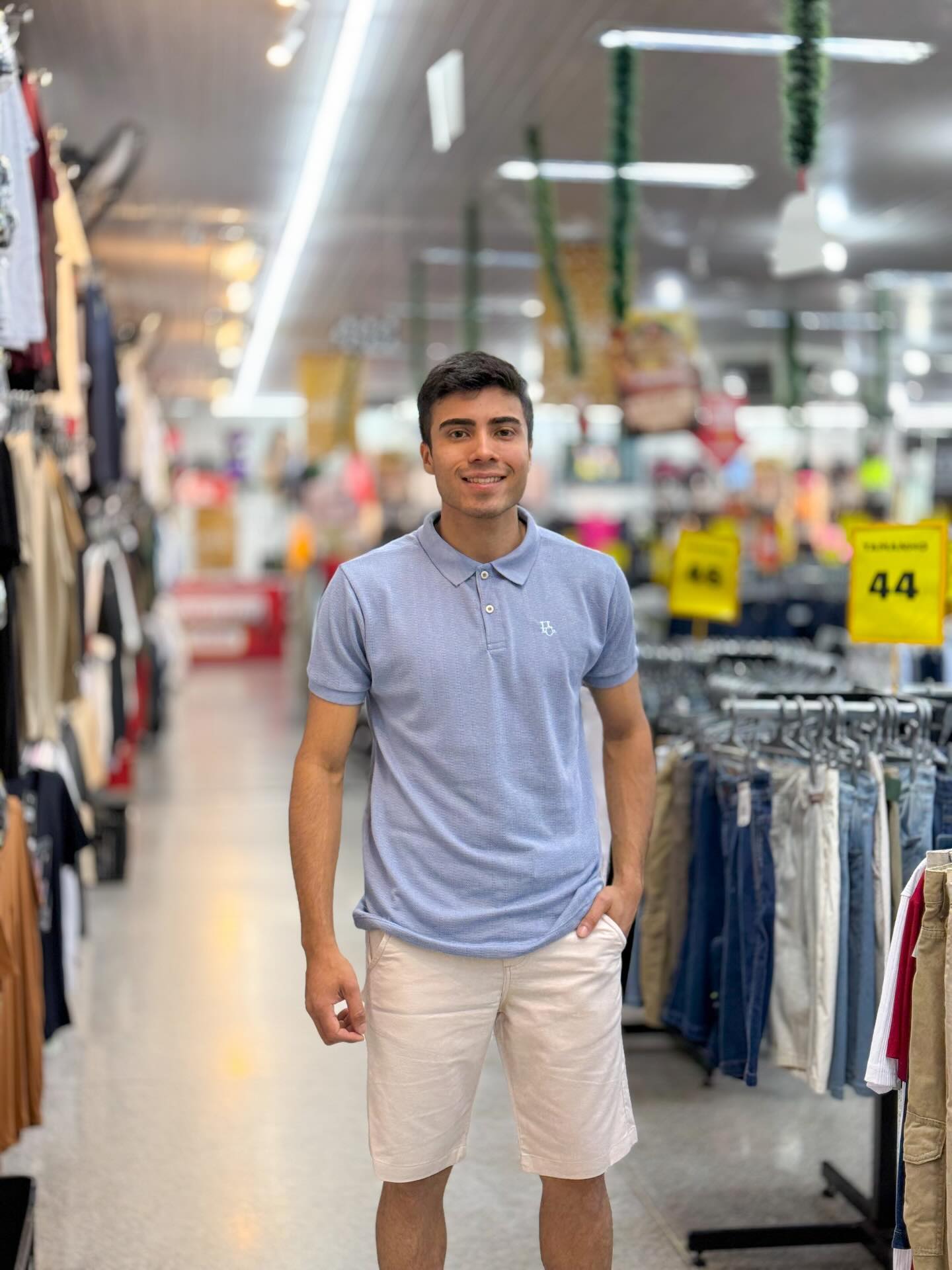 Woman having dark glasses in grey dress