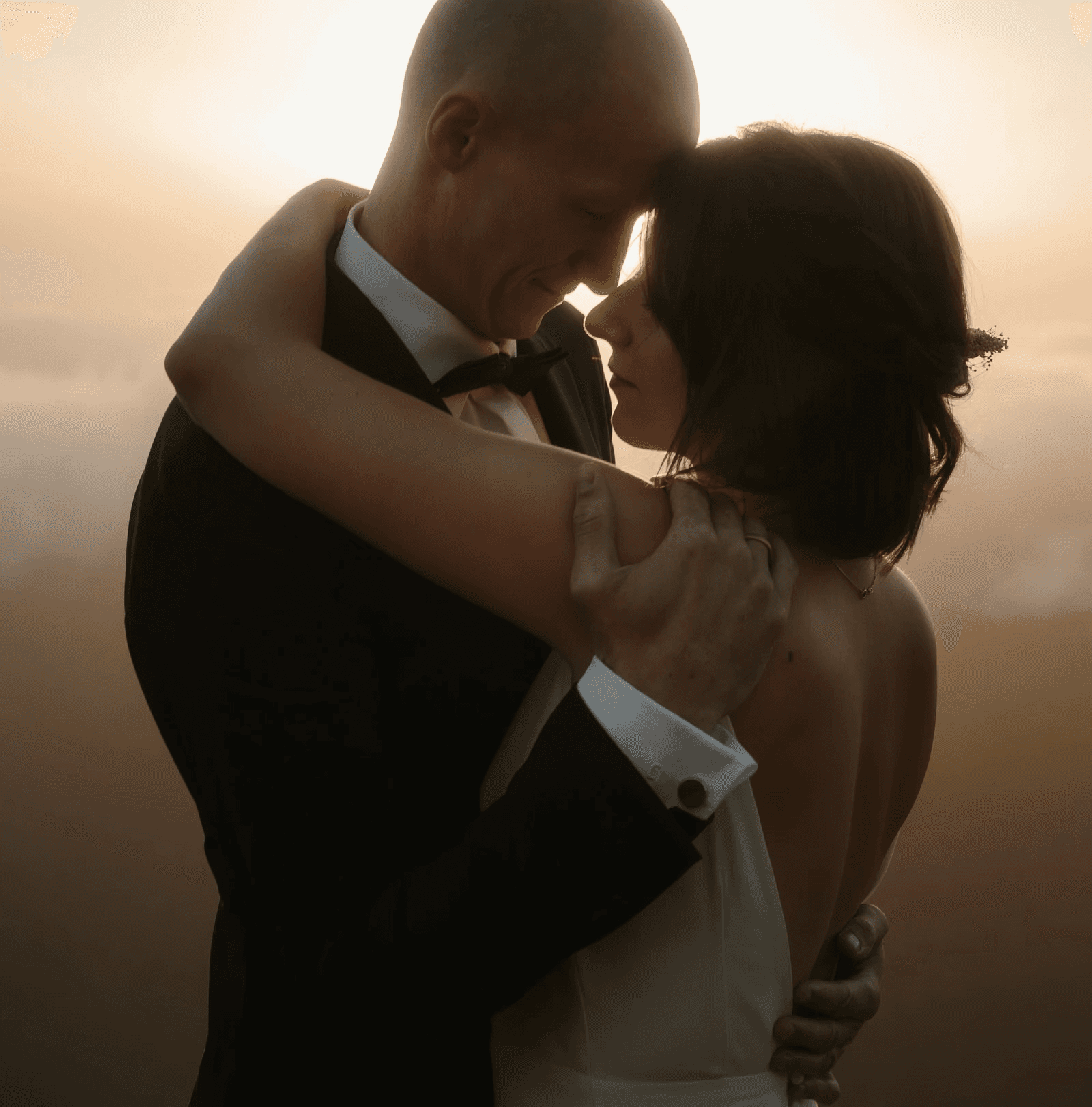 Europe elopement couple at sunrise above the clouds
