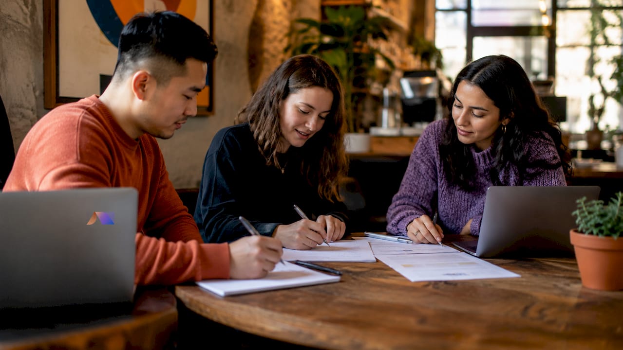 Recruiters collaborating on hiring intake process