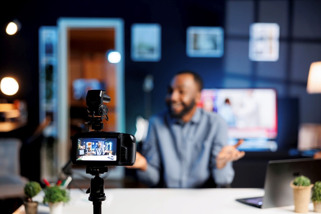 A person infront of a camera