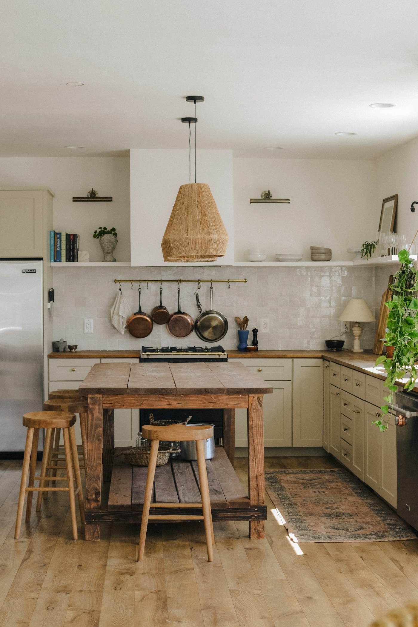 Rustic older-home kitchen with a wooden island
