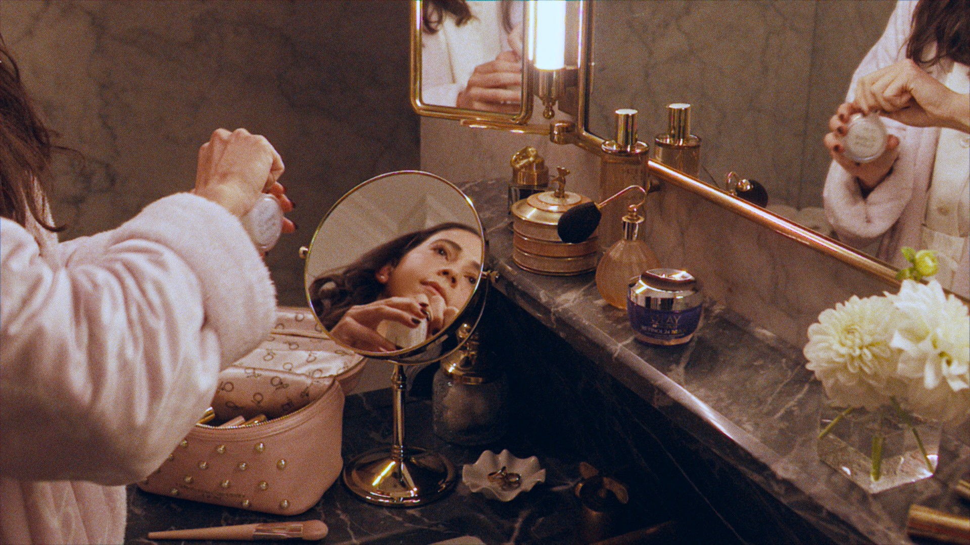 Wide angle of woman's beauty routine