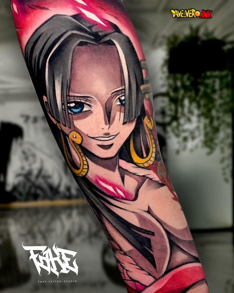 A tattoo of Boa Hancock by Dave Vero Ink, showcasing her intense and confident gaze with intricate details and bold colors