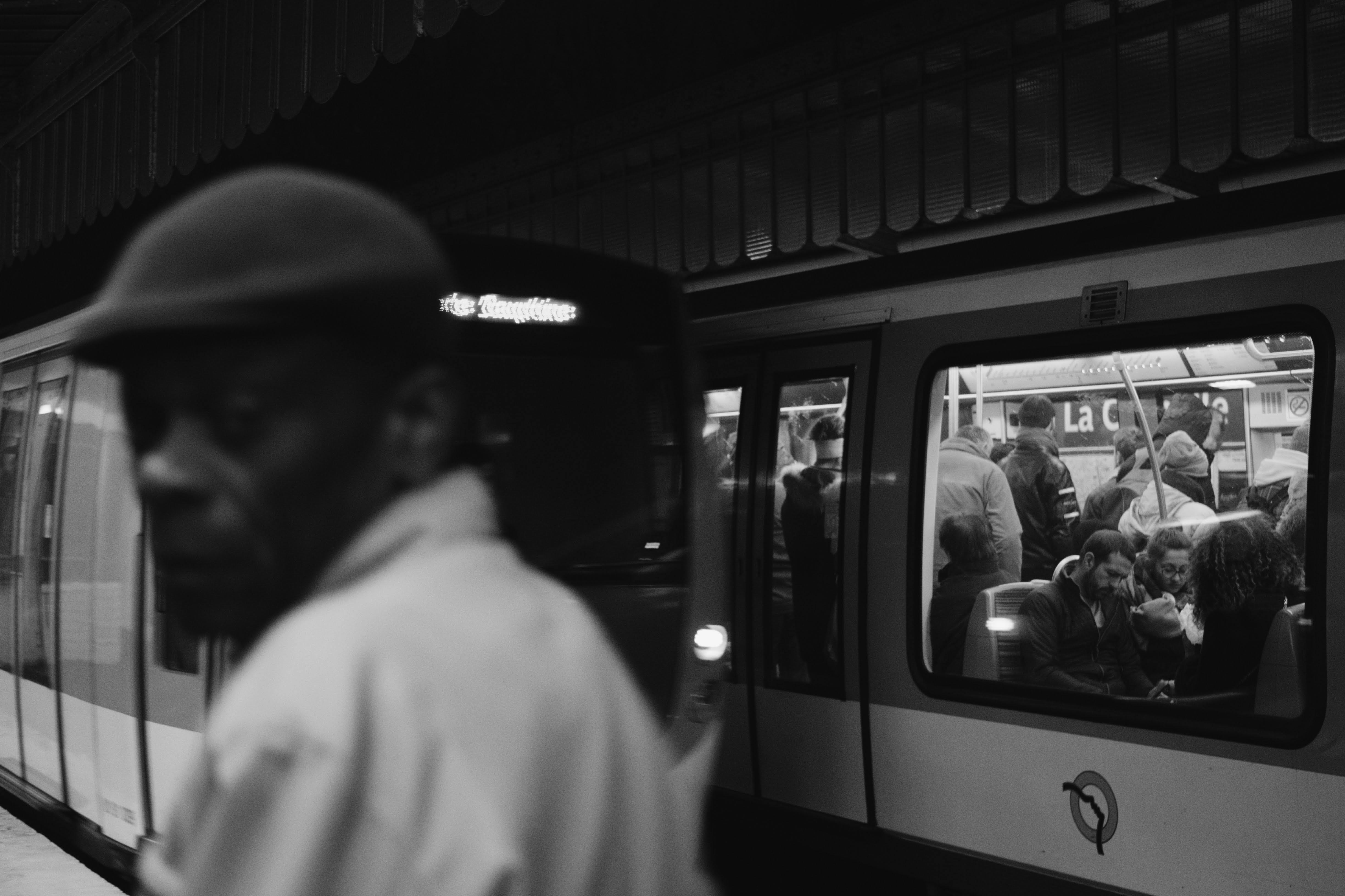 The image displays a large, illuminated advertising billboard at a street level, likely positioned to capture the attention of pedestrians and passing vehicles.