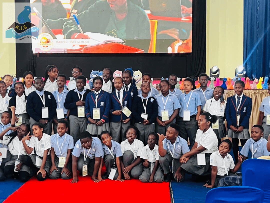 A school building stands against the backdrop of a clear sky