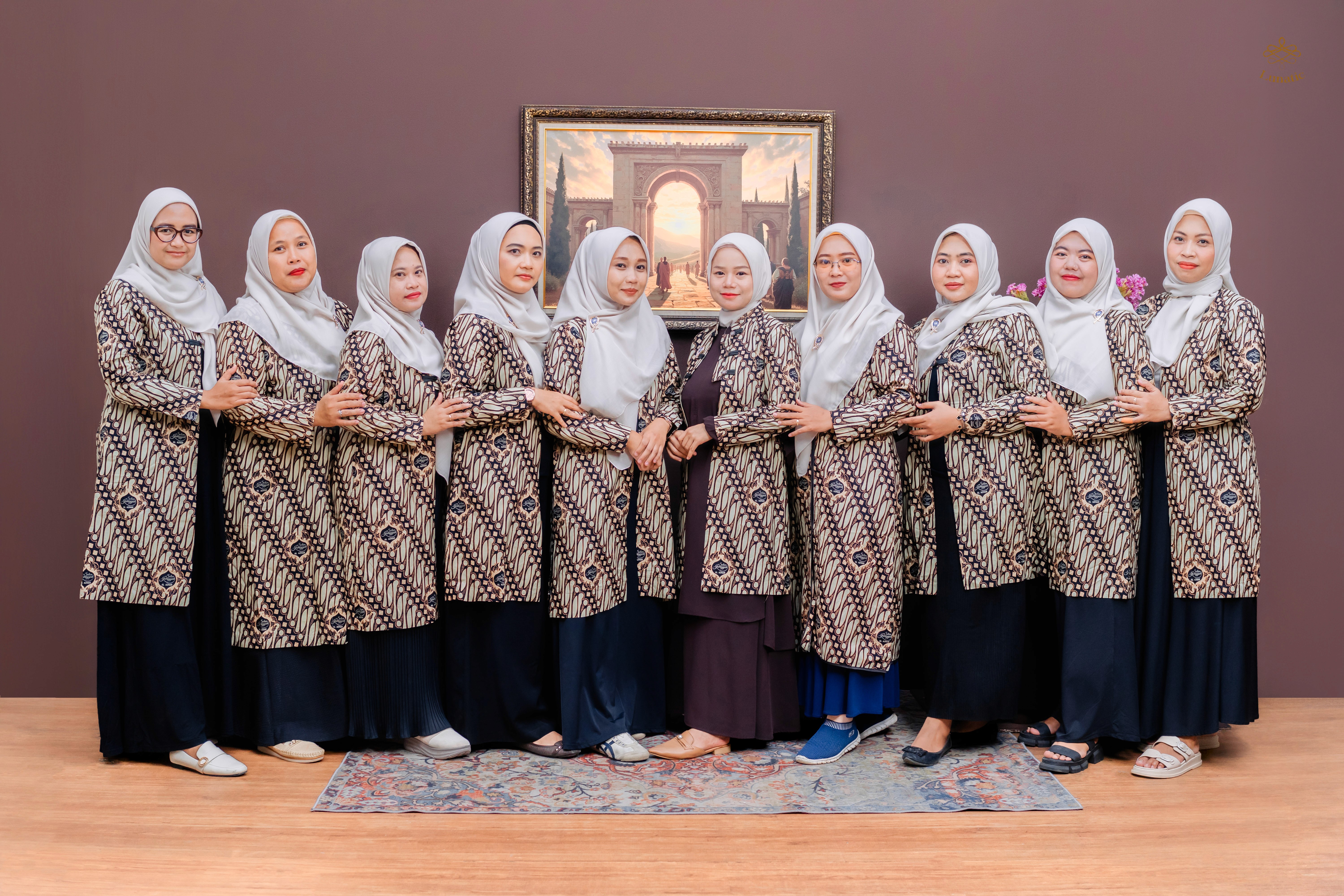 a group of young men sitting next to each other