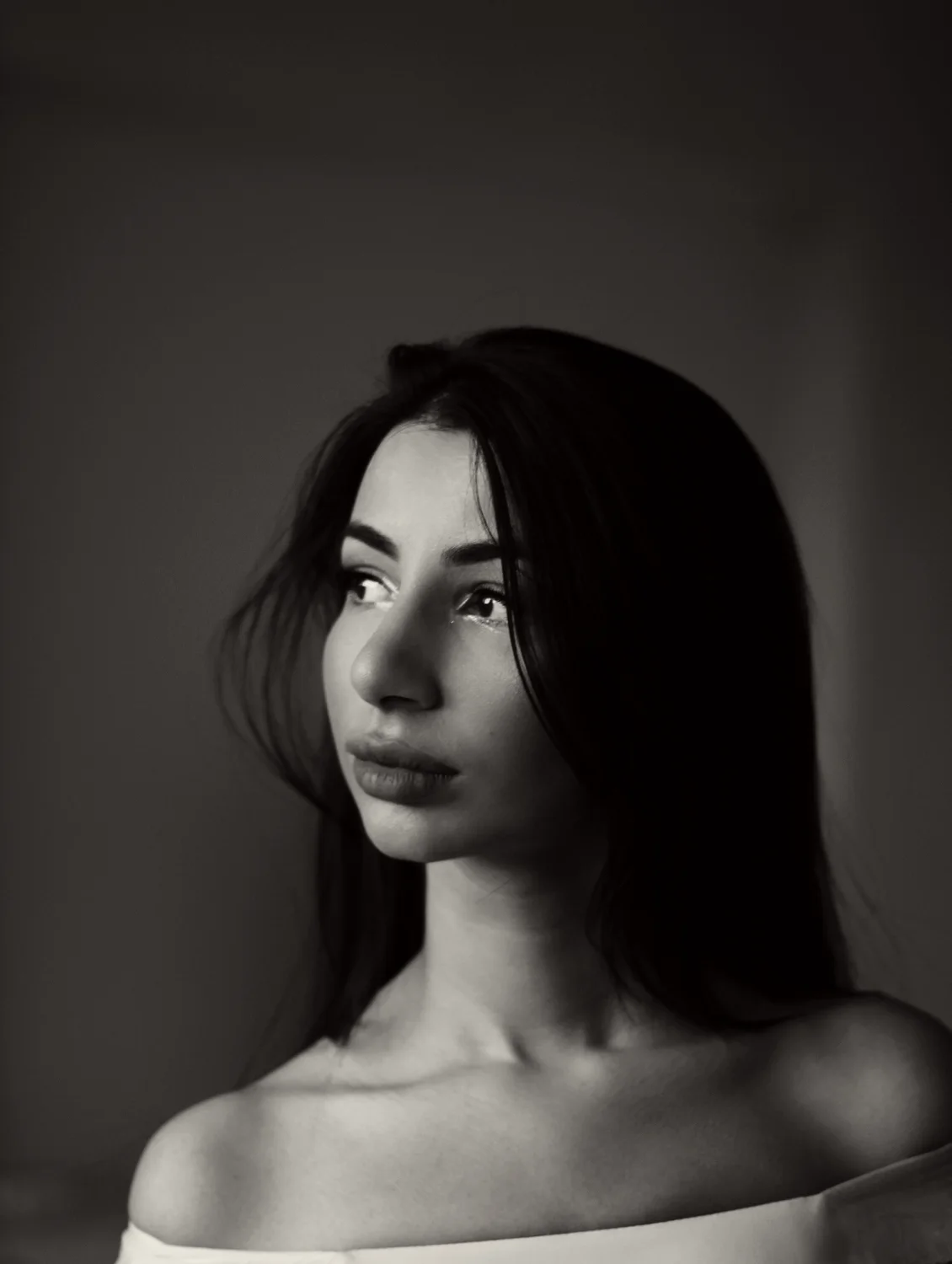 Black and white profile portrait of Vivienne Lark