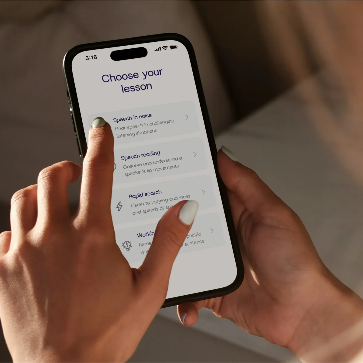 A hand holding a smartphone displaying a mobile app interface with a list and options on the screen.