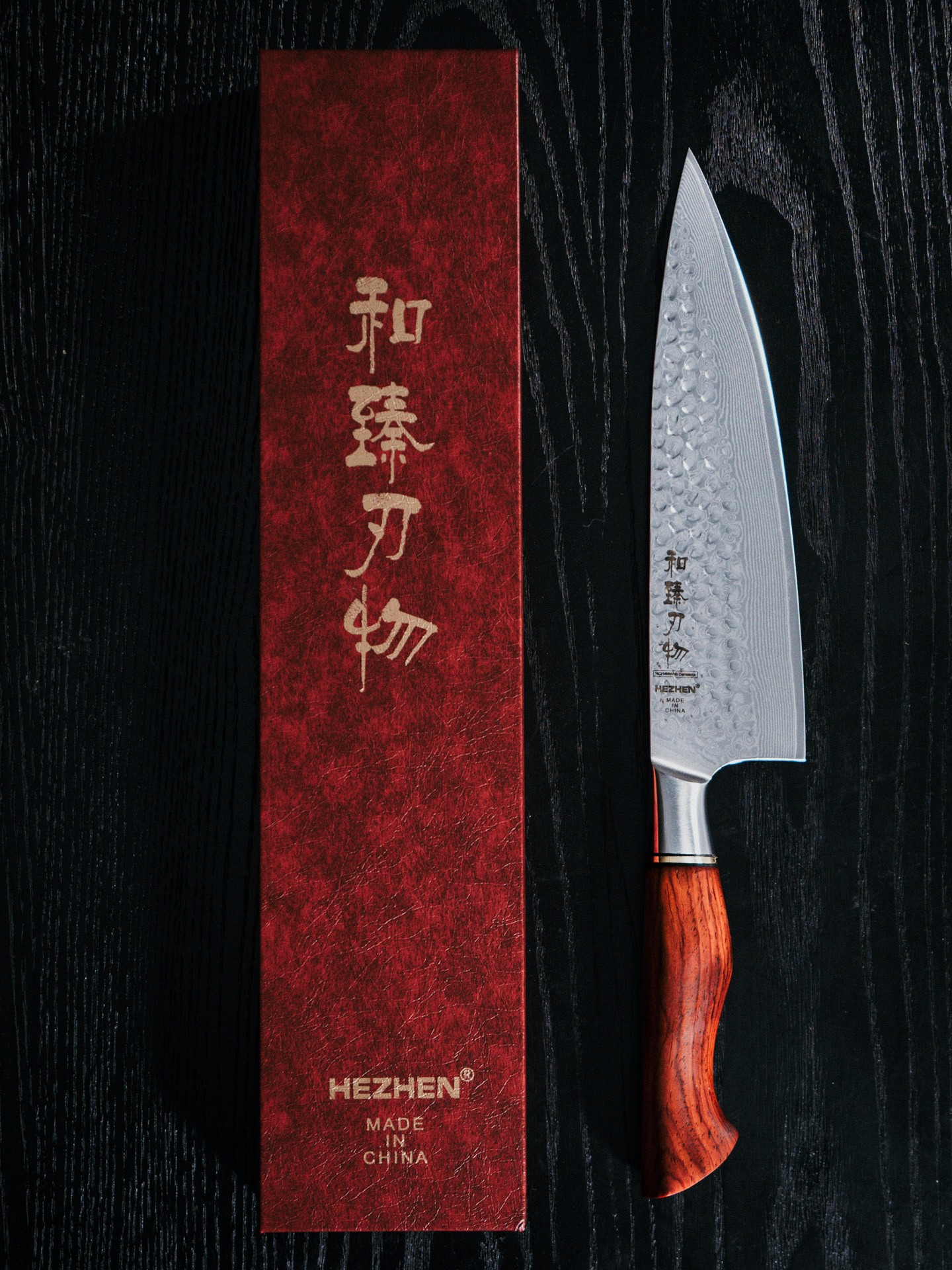 Set of polished kitchen knives on a pale surface