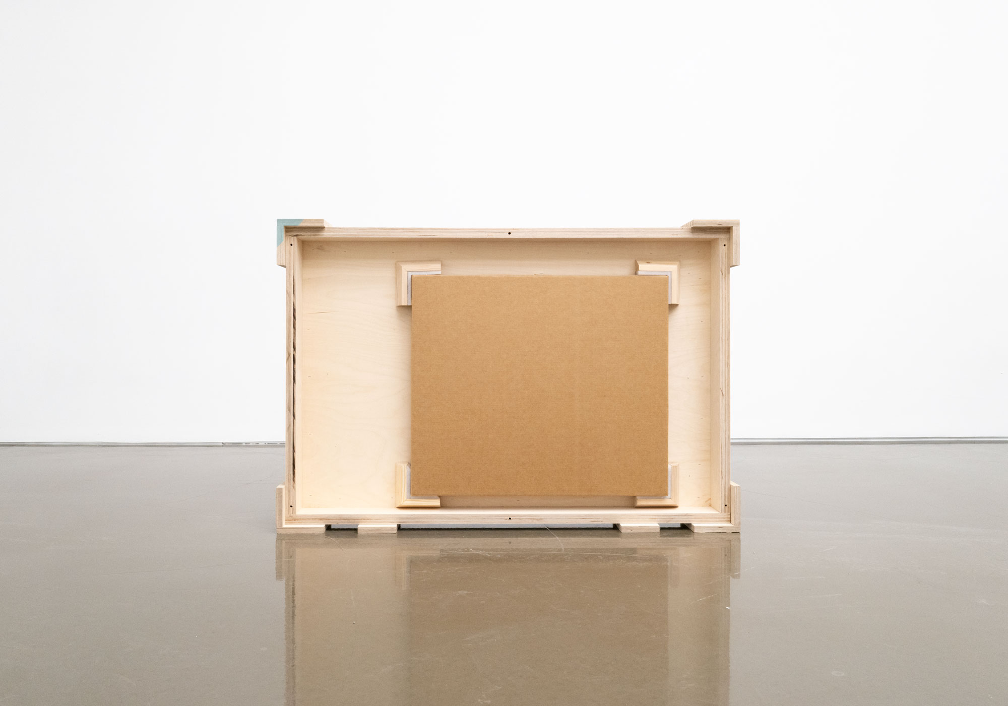 Cardboard packaging inside a crate