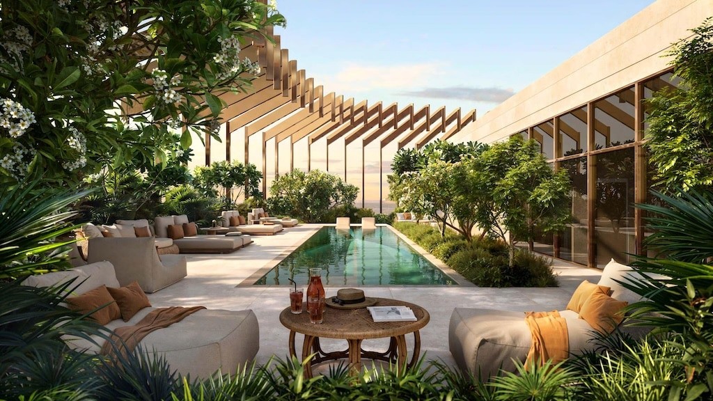 Spacious luxury condo living and dining area, adorned with contemporary decor and high-end furnishings.