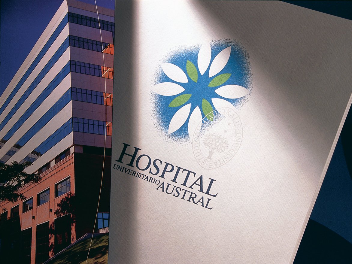 Rooftops of a coastal town with the sea in background