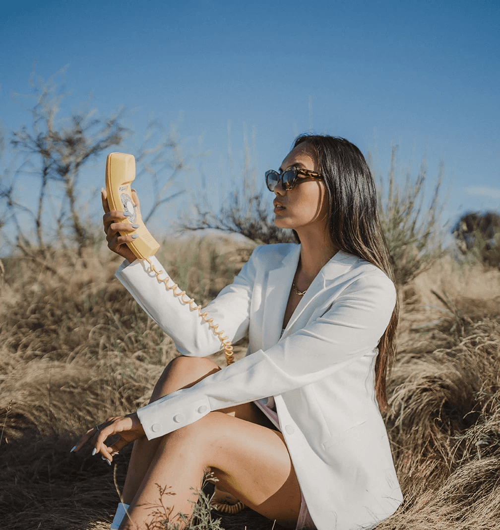 a blurry photo of a person standing in front of a wall