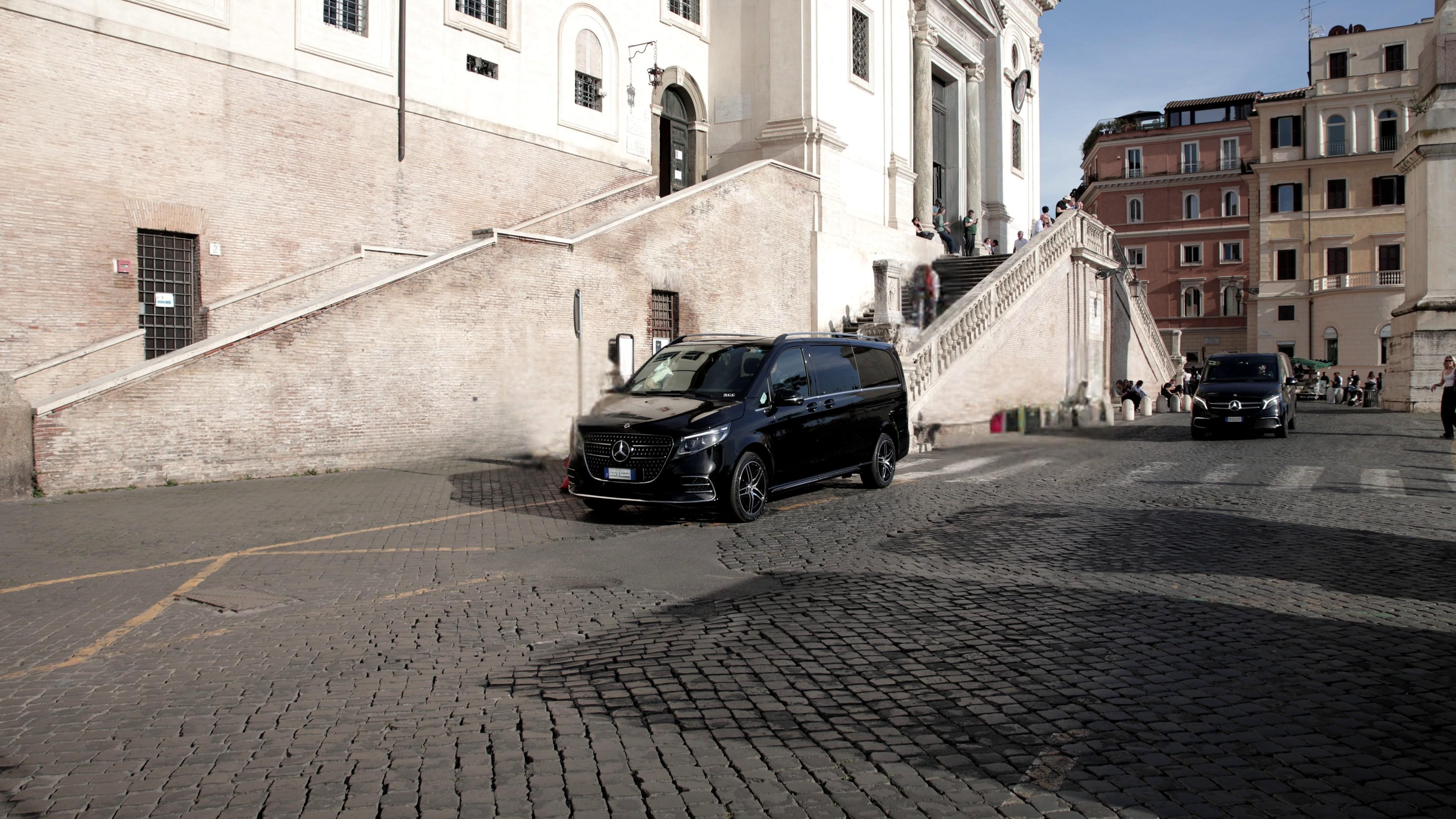 Mercedes van waiting in the front of a church in the middle of Italy